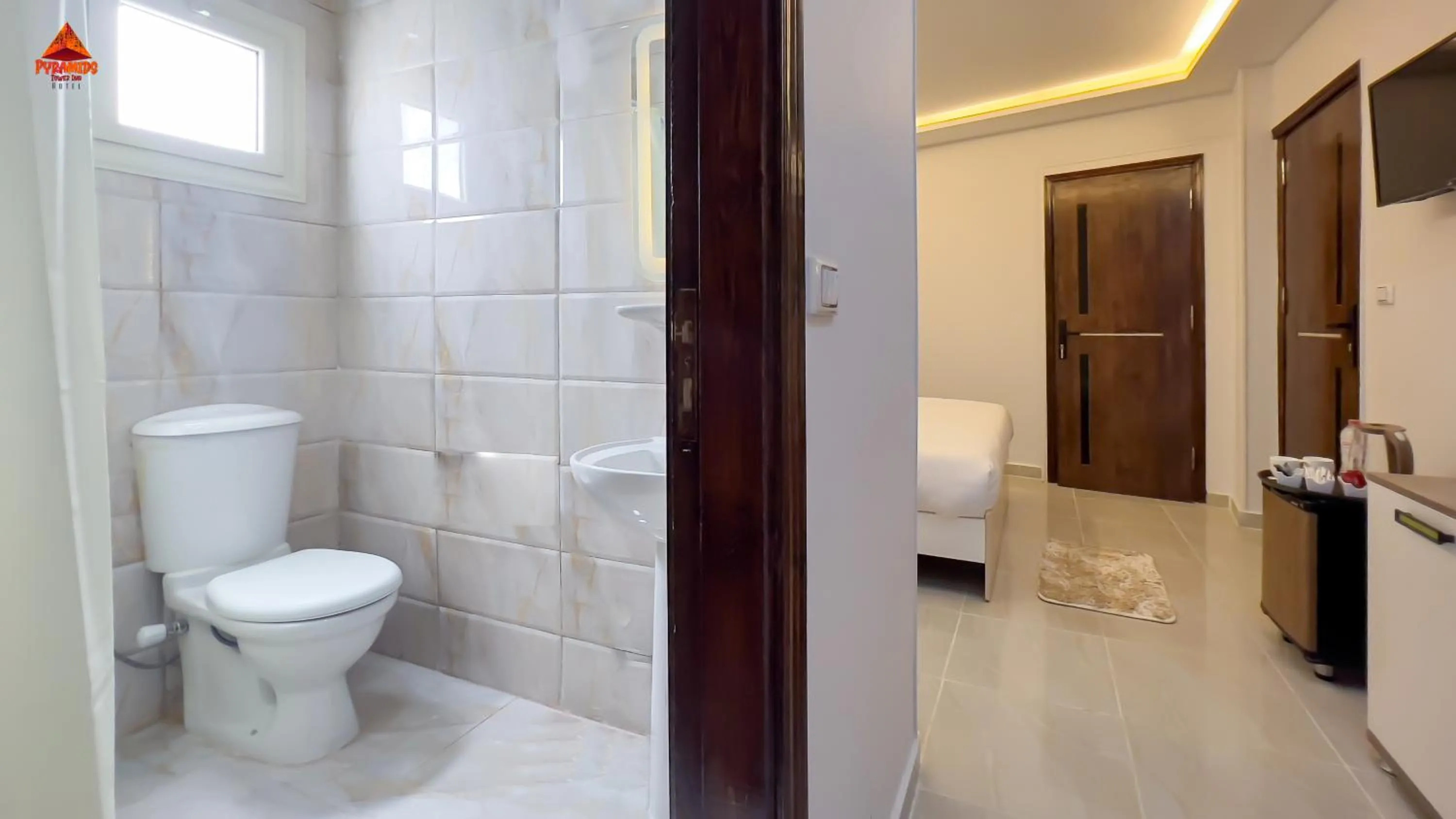 Shower in pyramids tower view inn