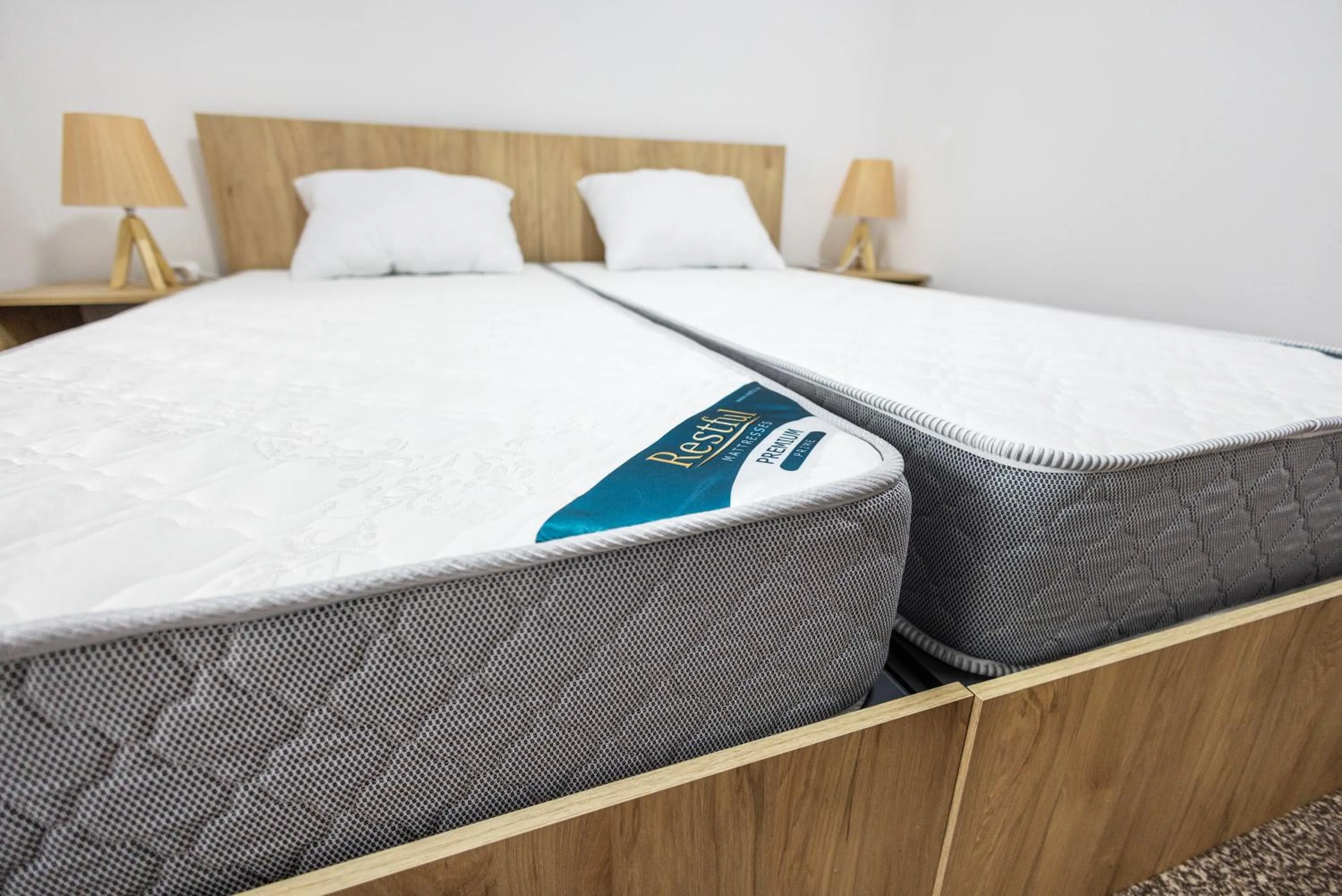 Bed in Hotel Arami by Downtown