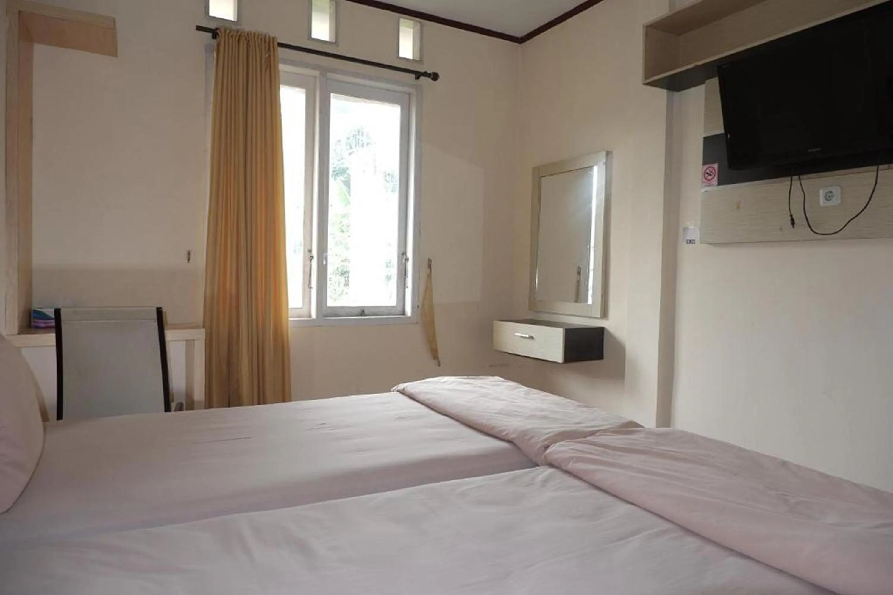 Bed in Hotel Manggasa Makale