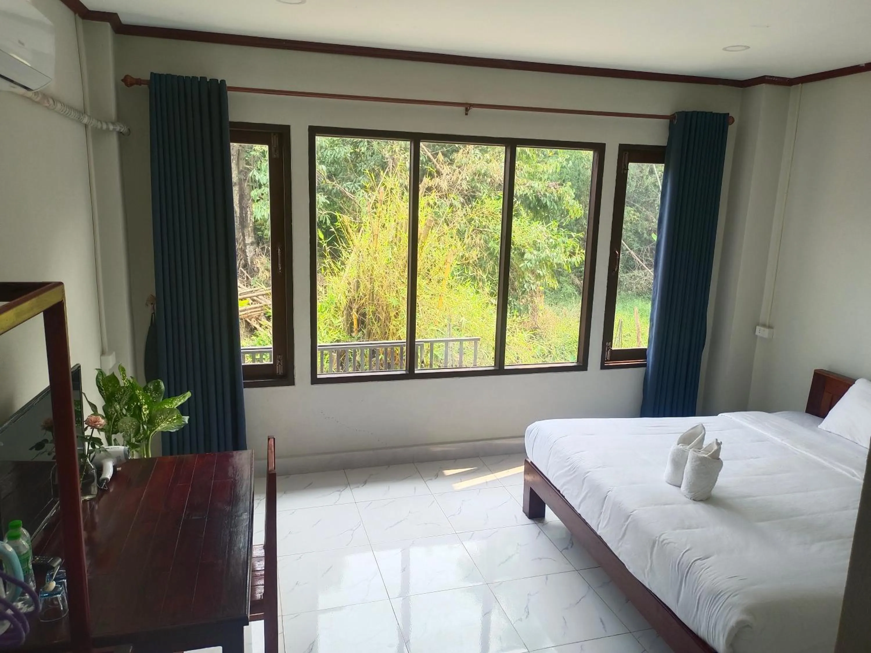 Bed in Vang Vieng Champa Resort