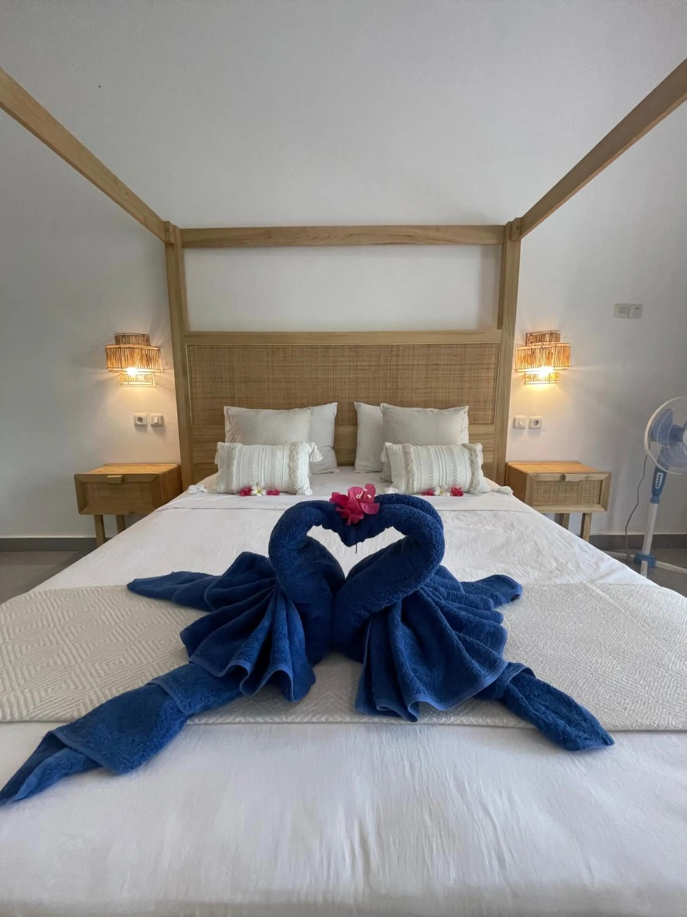 Bed in Blue EmOcean Dive Resort