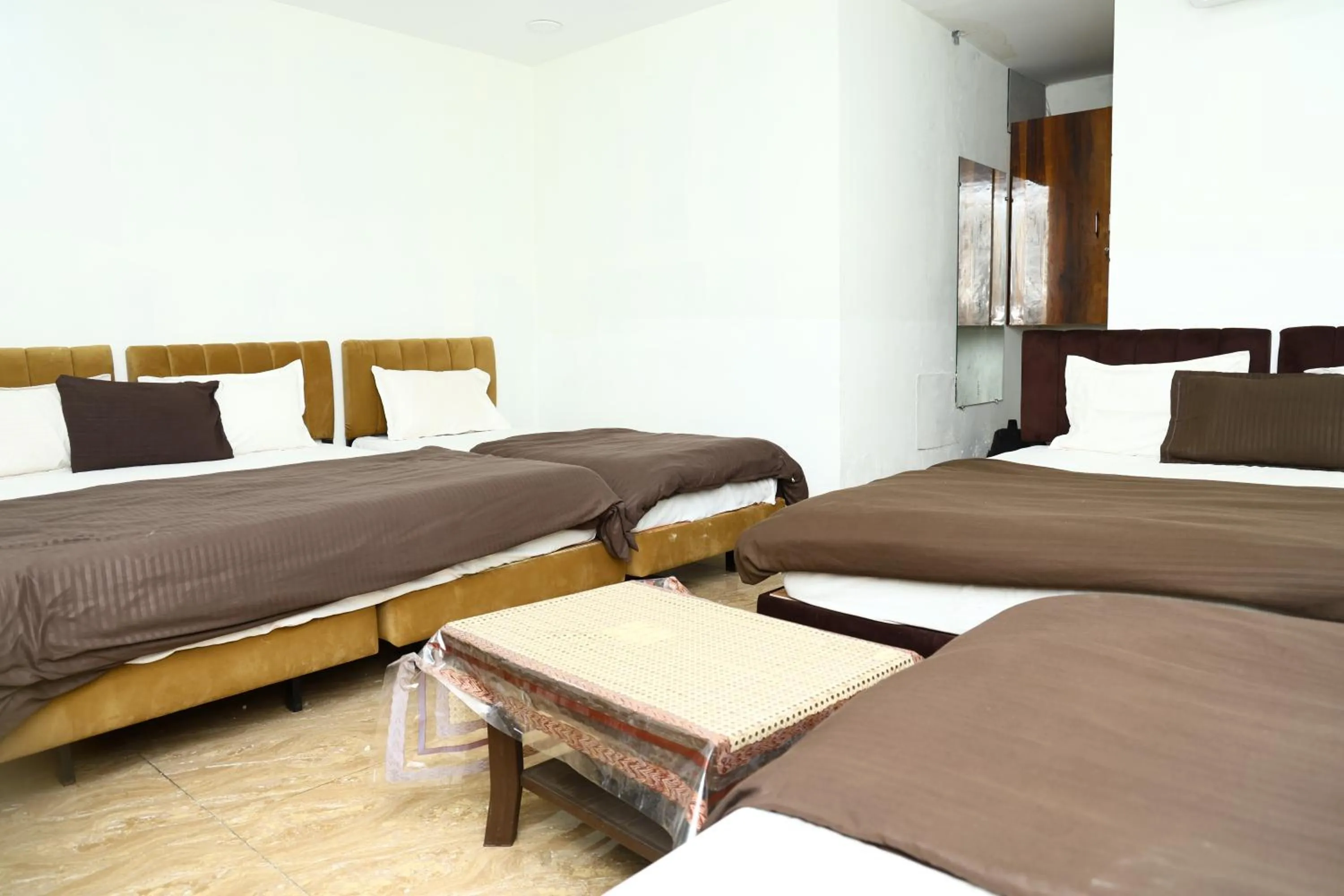 Bed in Hotel Kiwi Inn