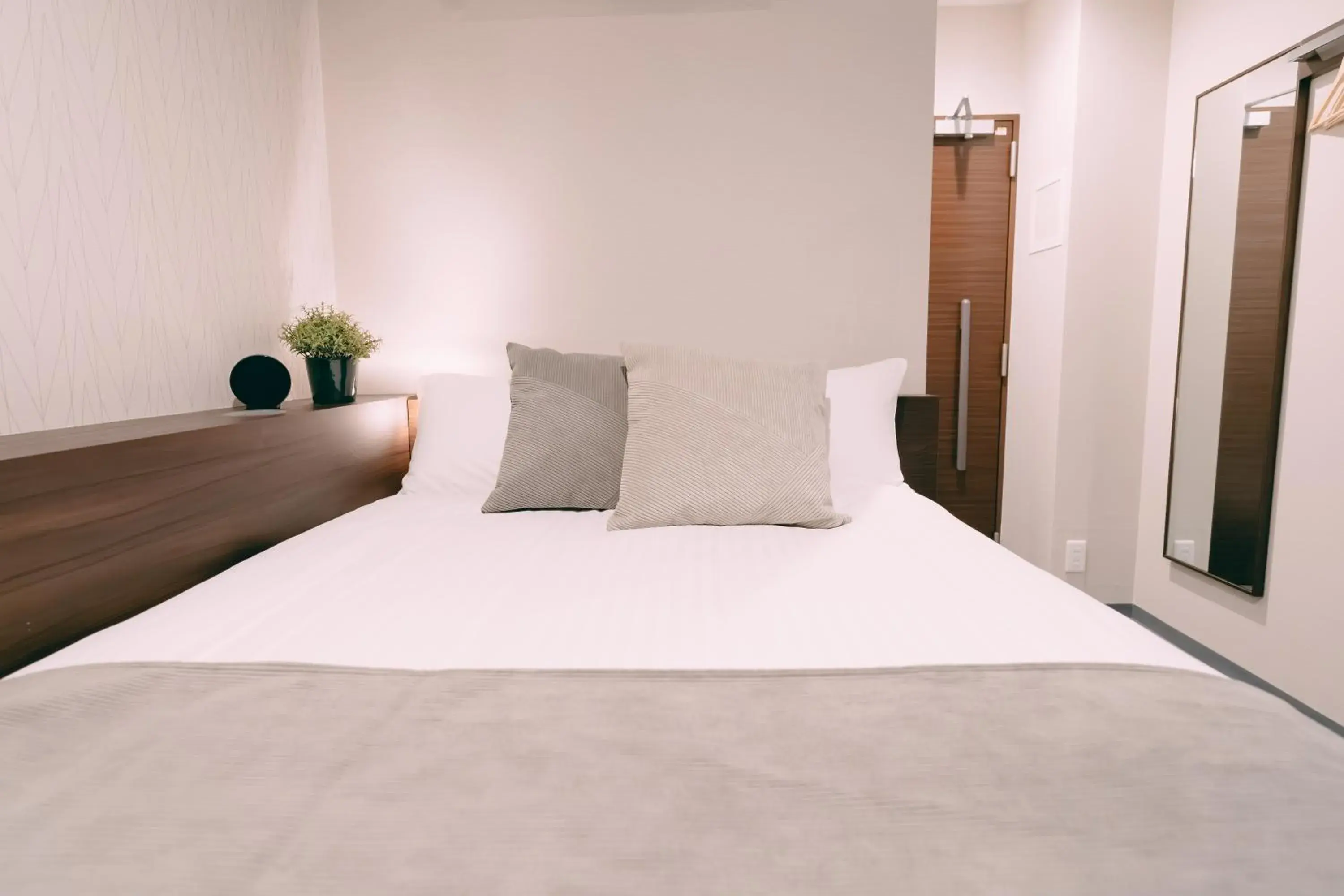 Bed in R Hotel Honmachi Bed in R Hotel Honmachi