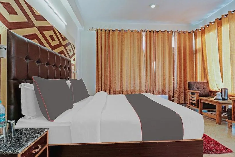 Bed in Hotel Neha Regency