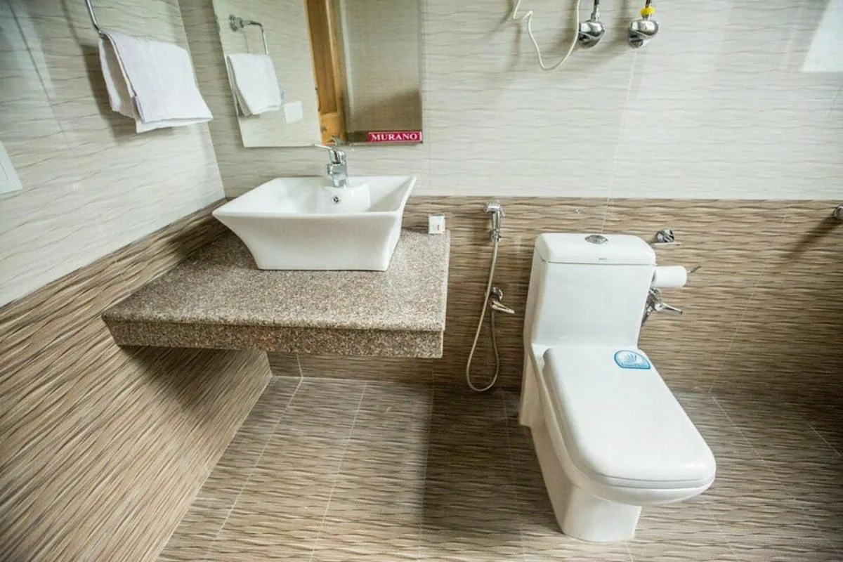 Bathroom in Hotel Neha Regency