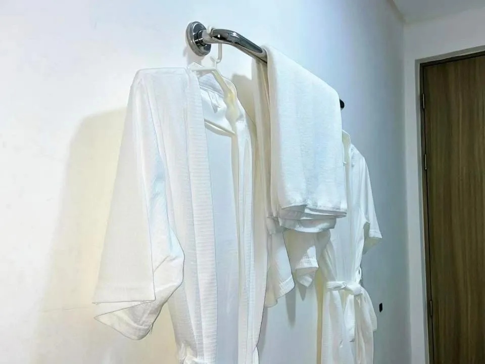 towels in Cozy Belle Suite Relaxing Place at SMDC Hope Residences