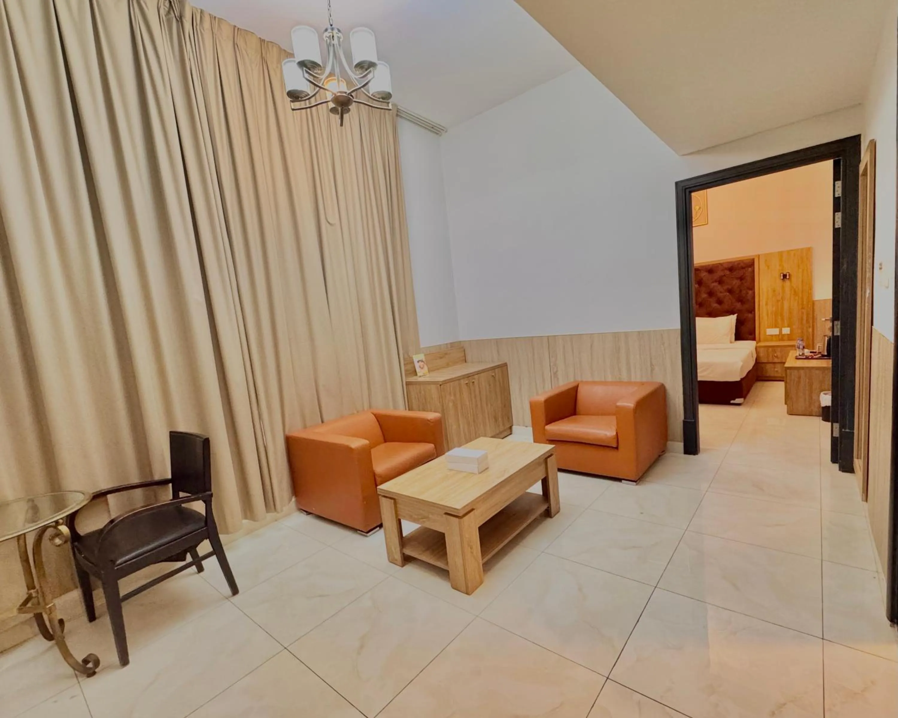 Living room in New Dream Plaza Hotel Apartment