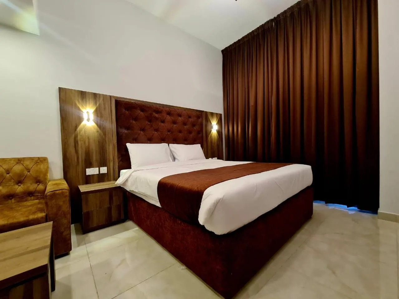 Bed in New Dream Plaza Hotel Apartment