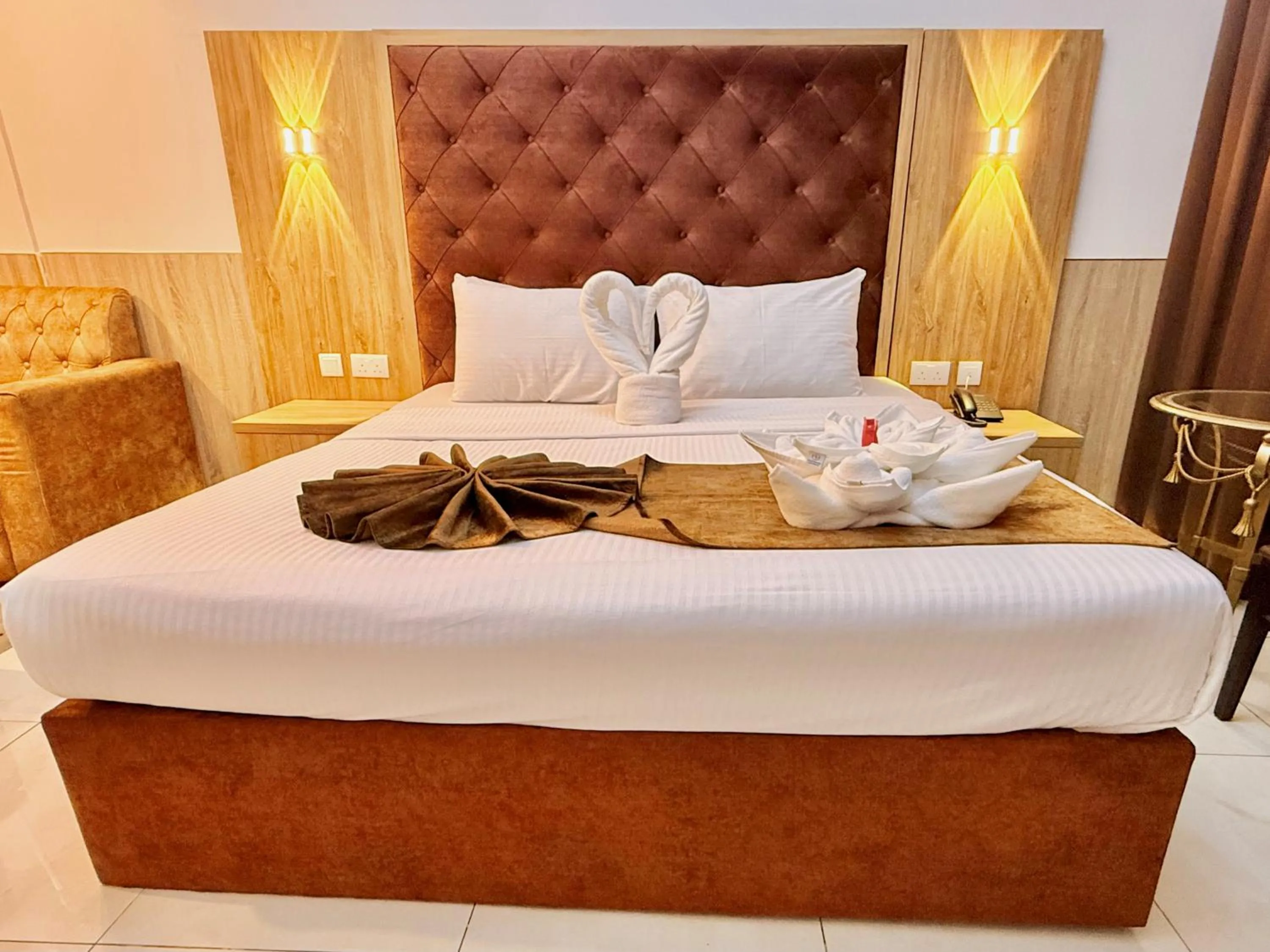 Bed in New Dream Plaza Hotel Apartment