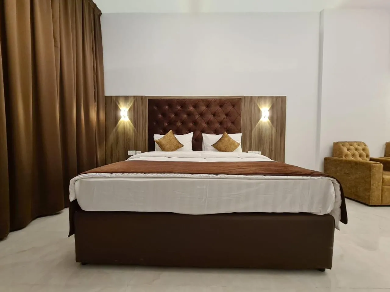 Bed in New Dream Plaza Hotel Apartment