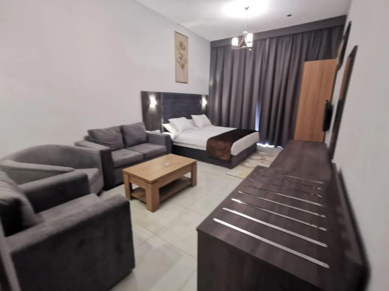 Bed in New Dream Plaza Hotel Apartment