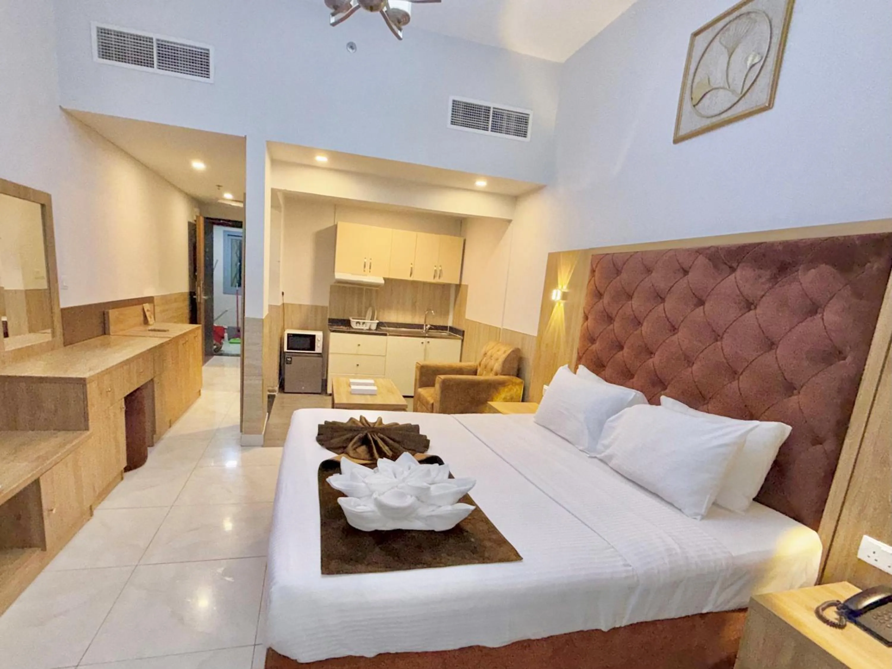 Kitchen or kitchenette in New Dream Plaza Hotel Apartment
