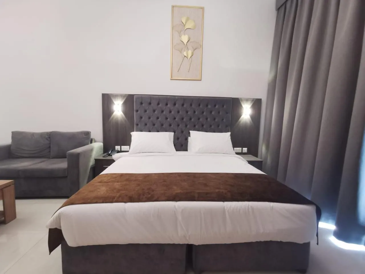 Bed in New Dream Plaza Hotel Apartment