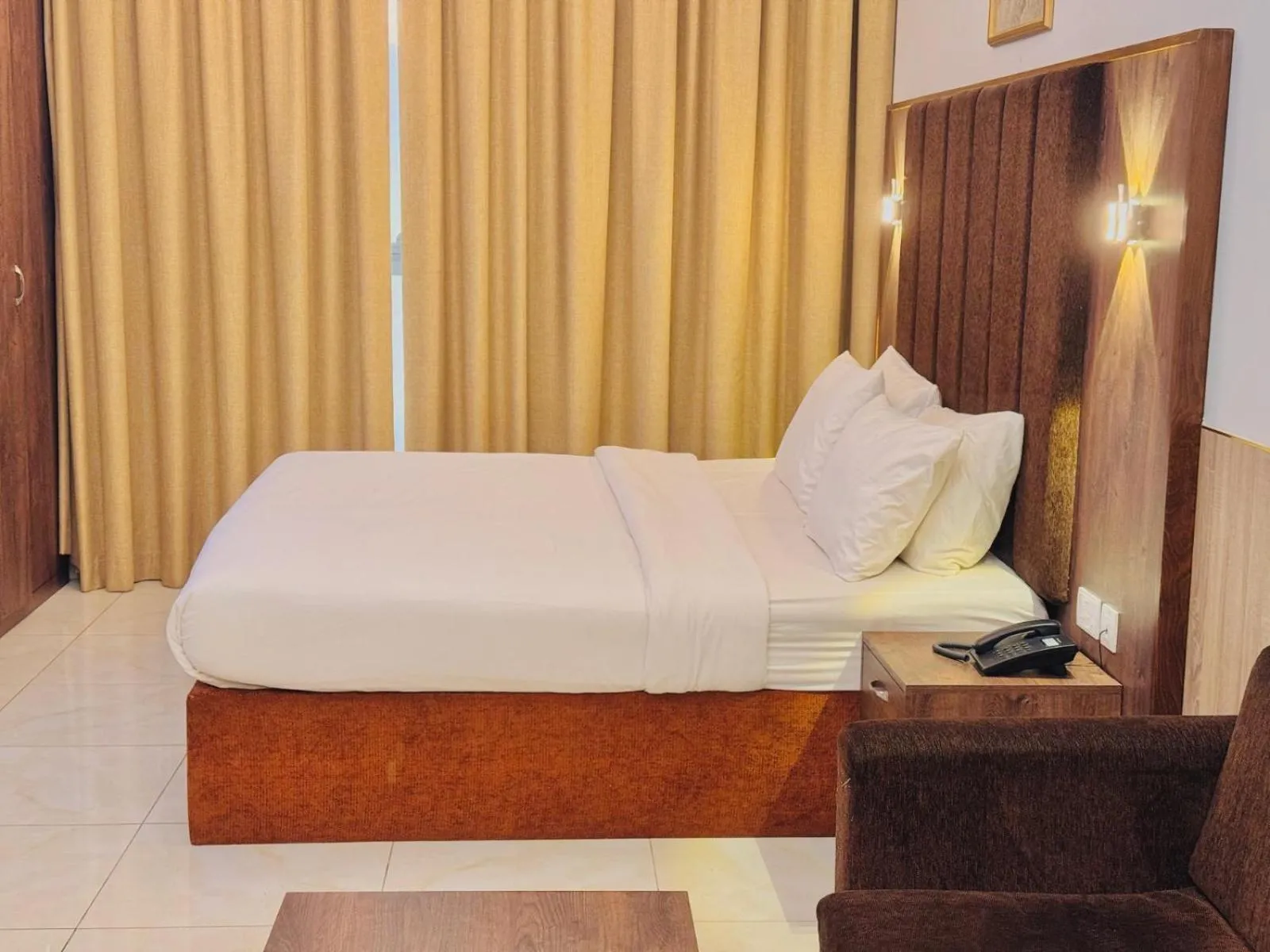 Bed in New Dream Plaza Hotel Apartment