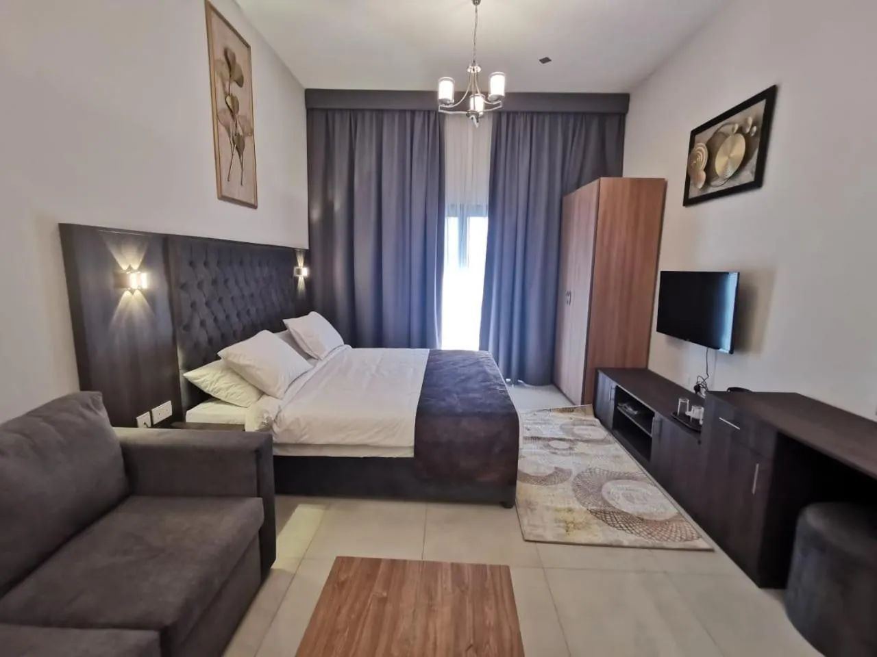 Bed in New Dream Plaza Hotel Apartment