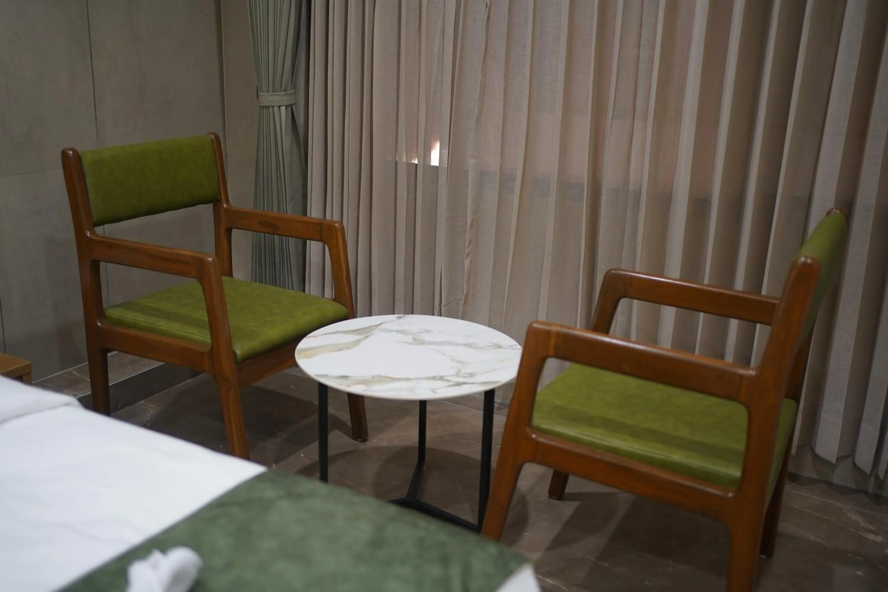 Seating area in HOTEL STATURE INN