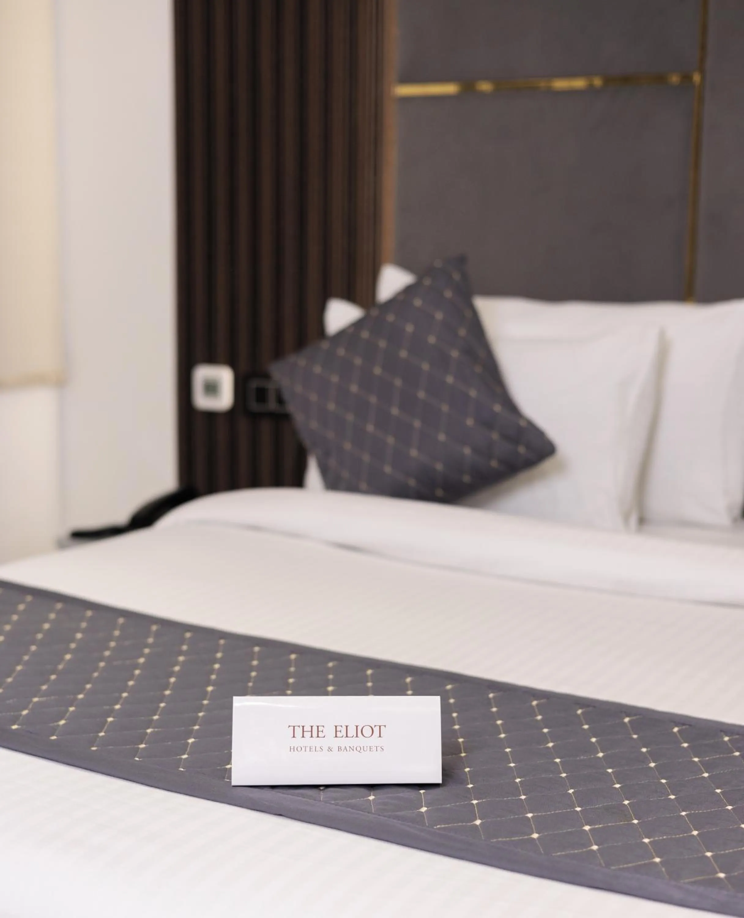 Bed in The Eliot Hotel & Banquet