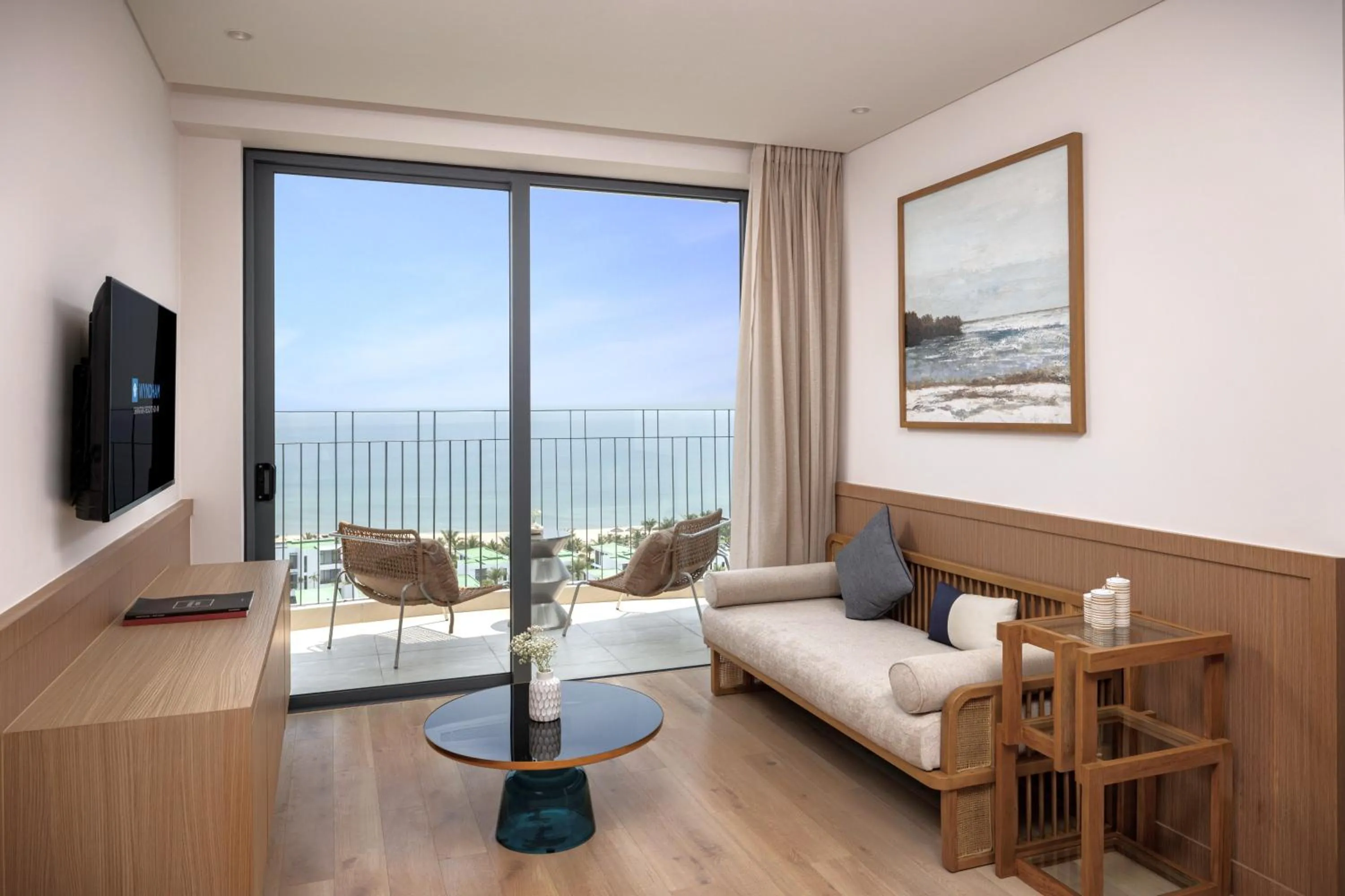 TV and multimedia in Wyndham Hoi An Royal Beachfront Resort & Villas