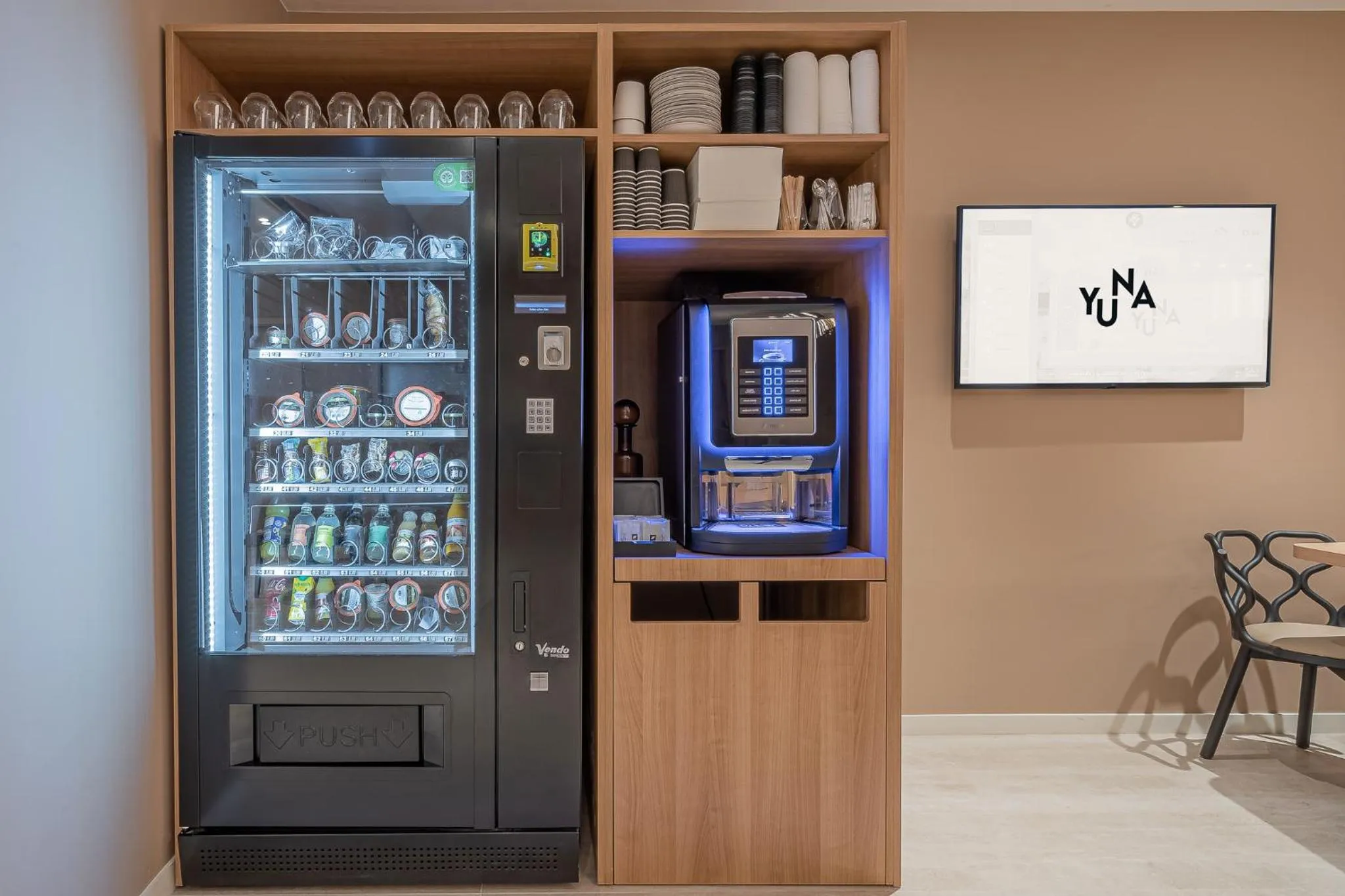 vending machine in Yuna Porte-Maillot - ApartHotel