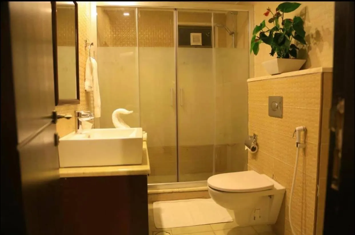 Bathroom in LANCASTER HOTEL APARTMENTS DAHIET ALRASHEED