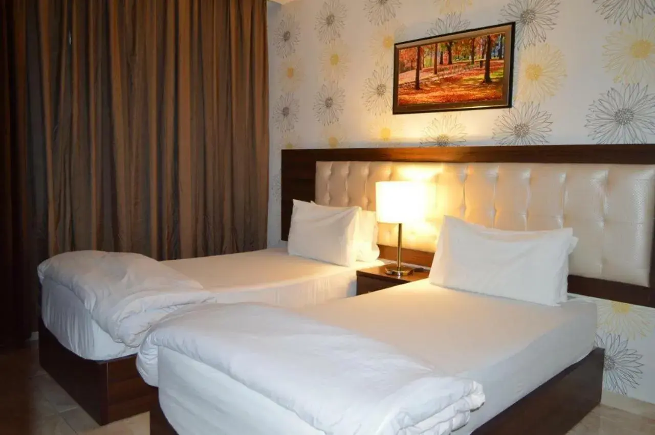 Bedroom, Bed in LANCASTER HOTEL APARTMENTS DAHIET ALRASHEED Bedroom, Bed in LANCASTER HOTEL APARTMENTS DAHIET ALRASHEED