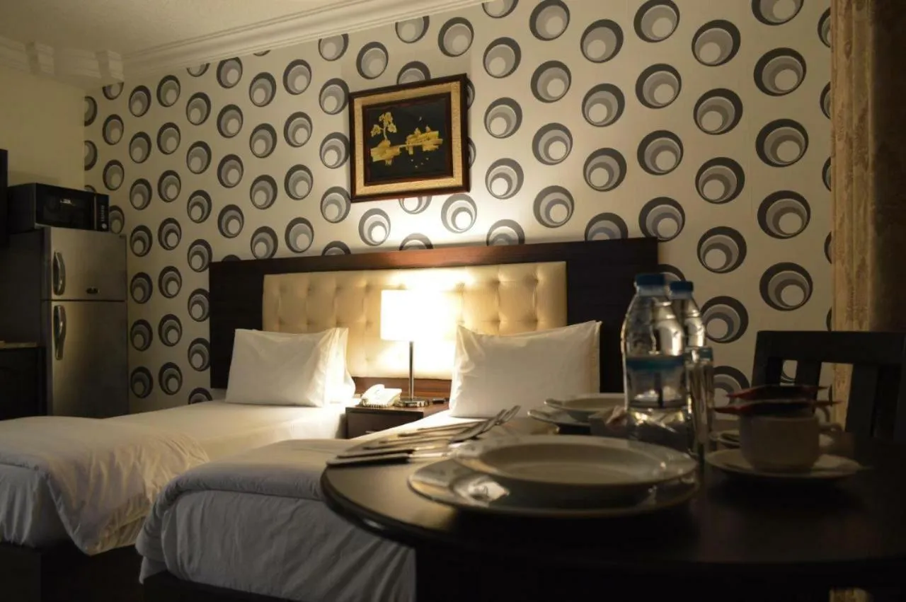 Bed in LANCASTER HOTEL APARTMENTS DAHIET ALRASHEED