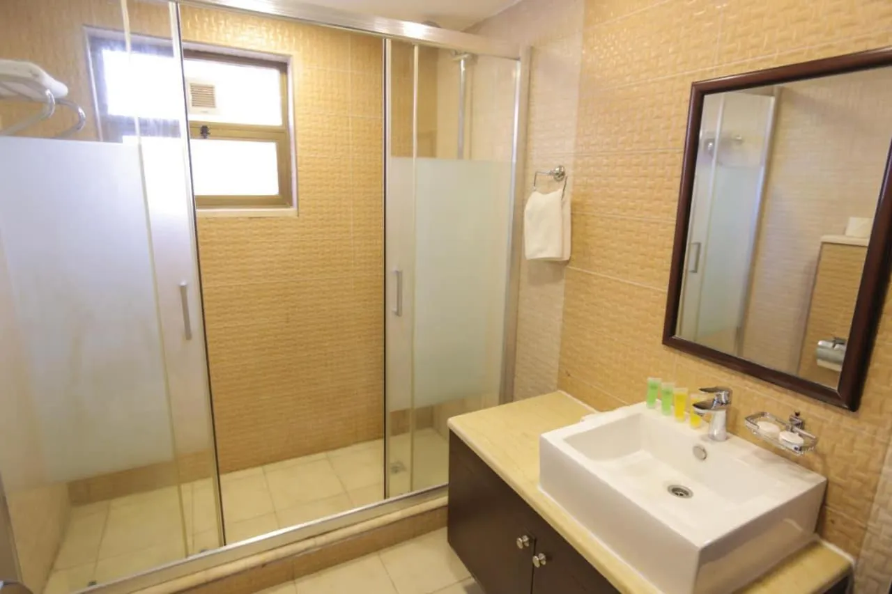 Bathroom in LANCASTER HOTEL APARTMENTS DAHIET ALRASHEED