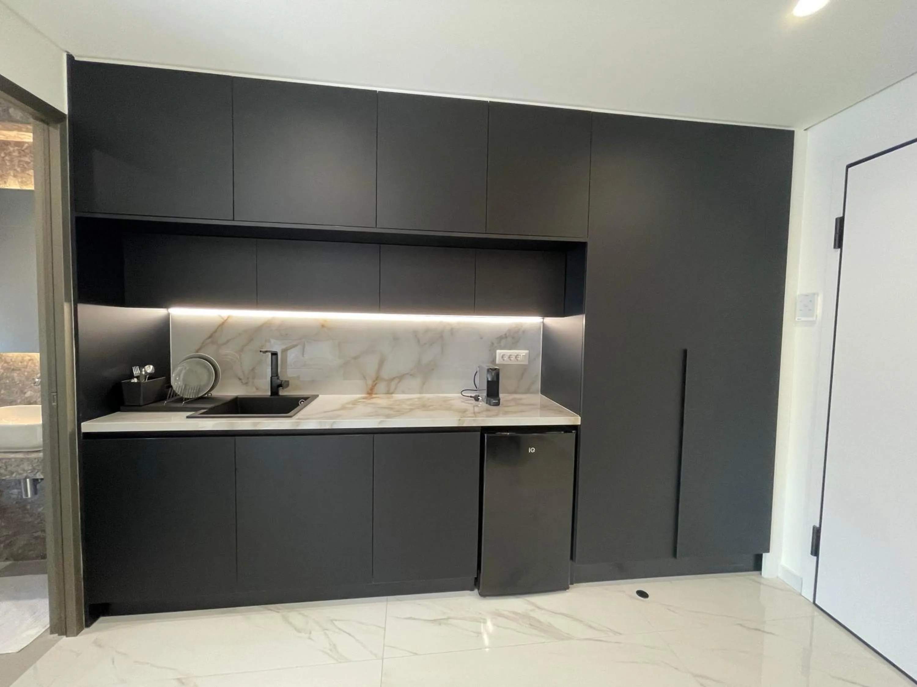 Kitchen or kitchenette in URBAN SUITES ATHENS