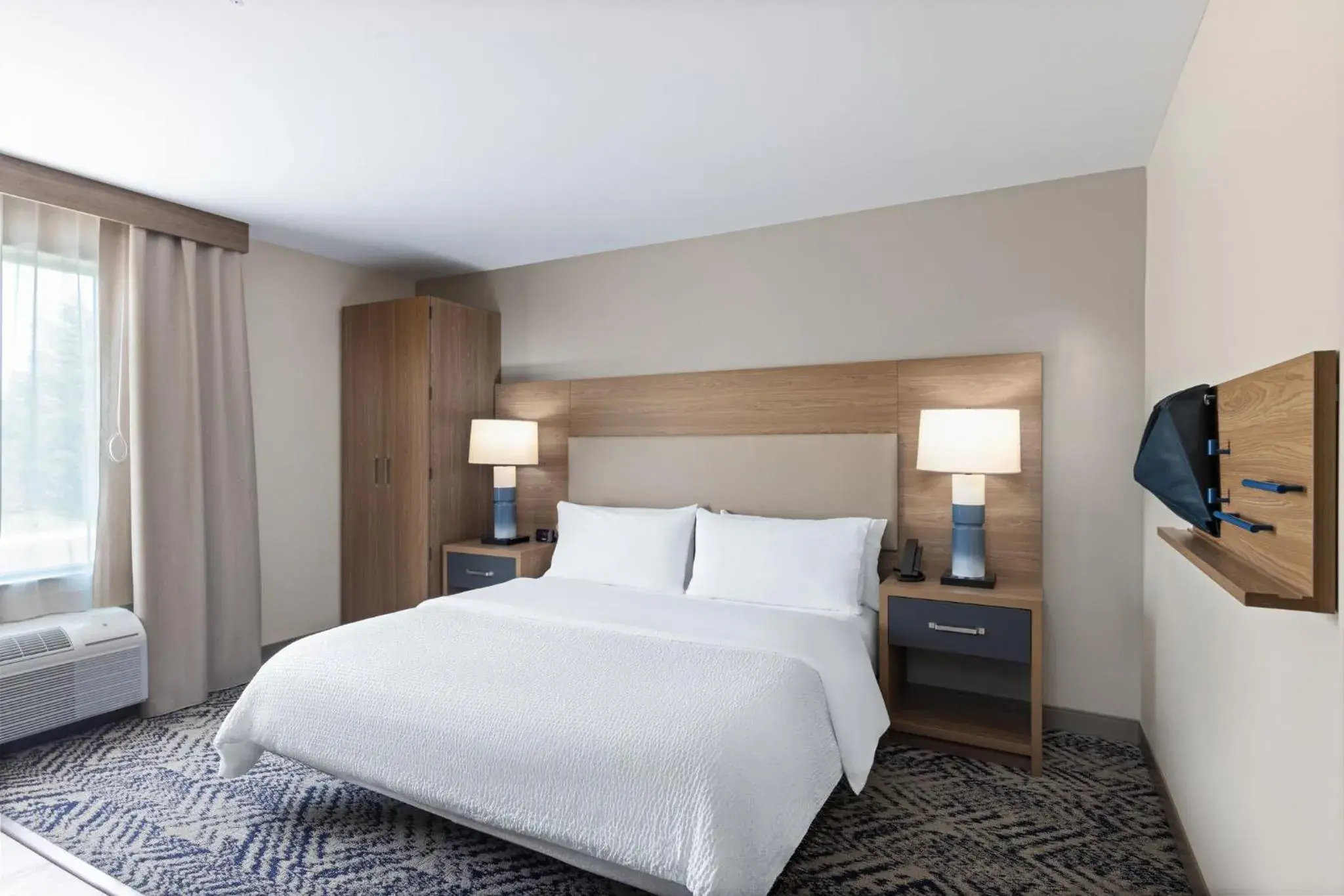 Photo of the whole room, Bed in Candlewood Suites McPherson by IHG Photo of the whole room, Bed in Candlewood Suites McPherson by IHG