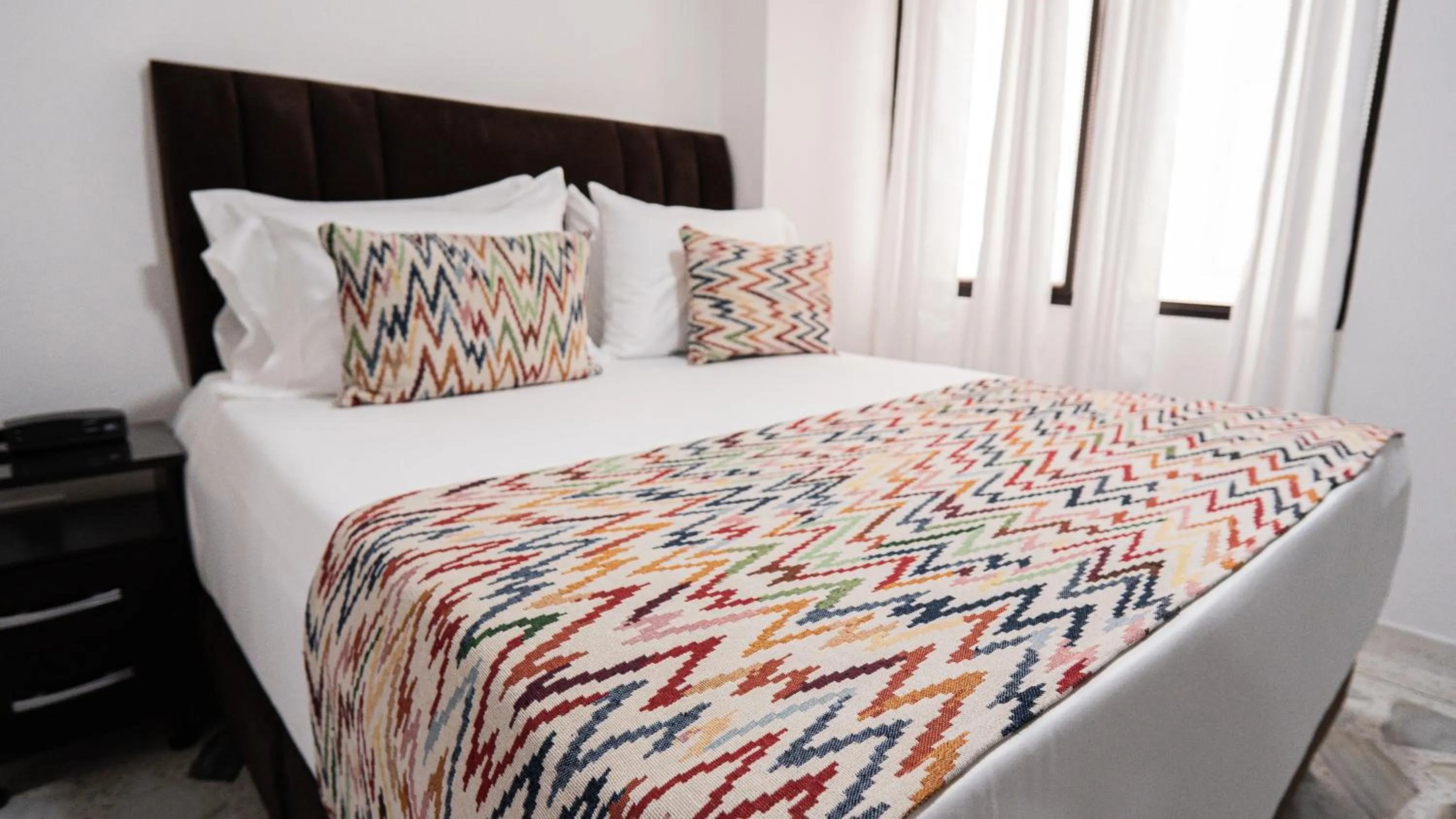 Bed in Hotel Arisha Cali