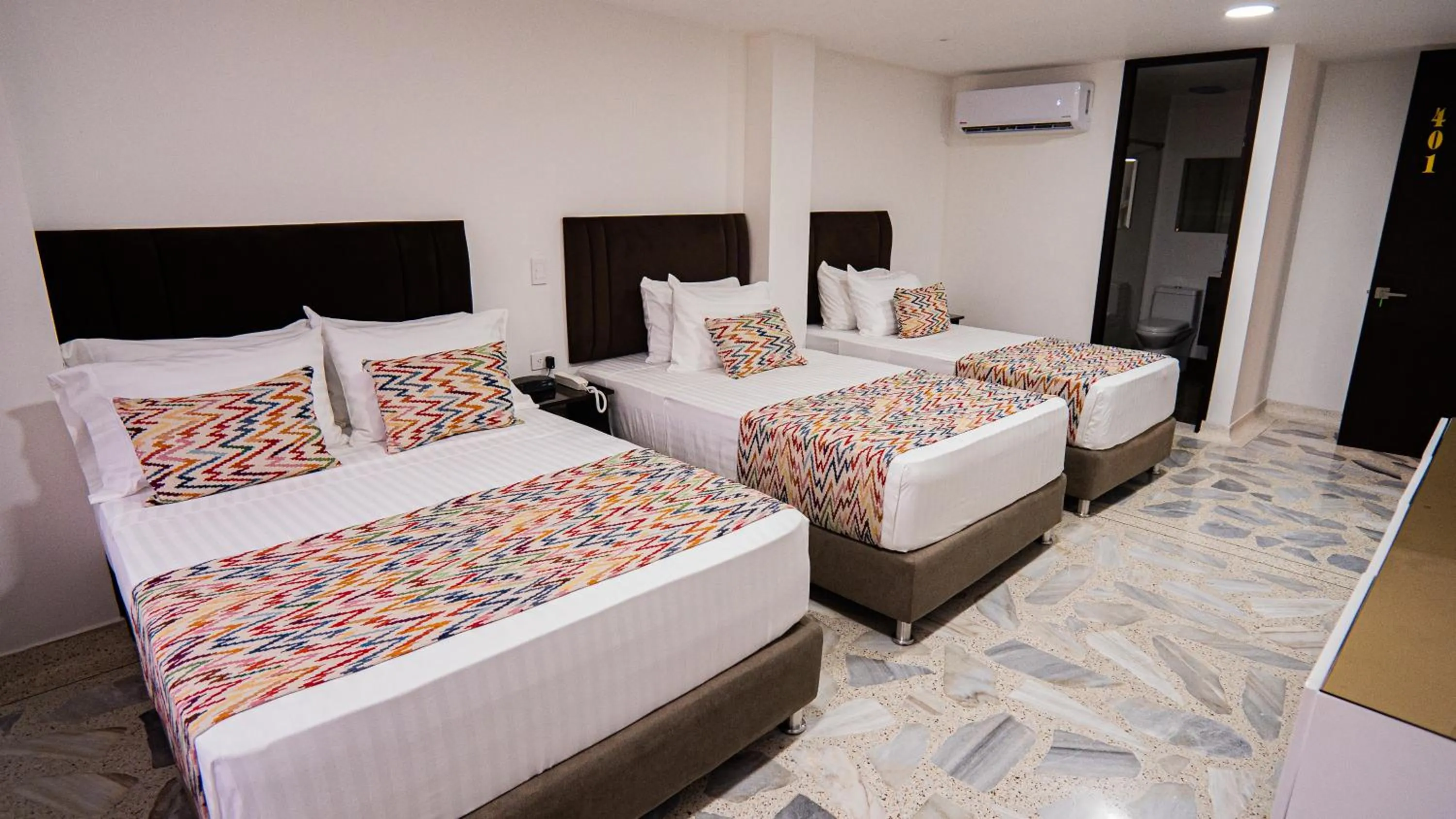 Bed in Hotel Arisha Cali