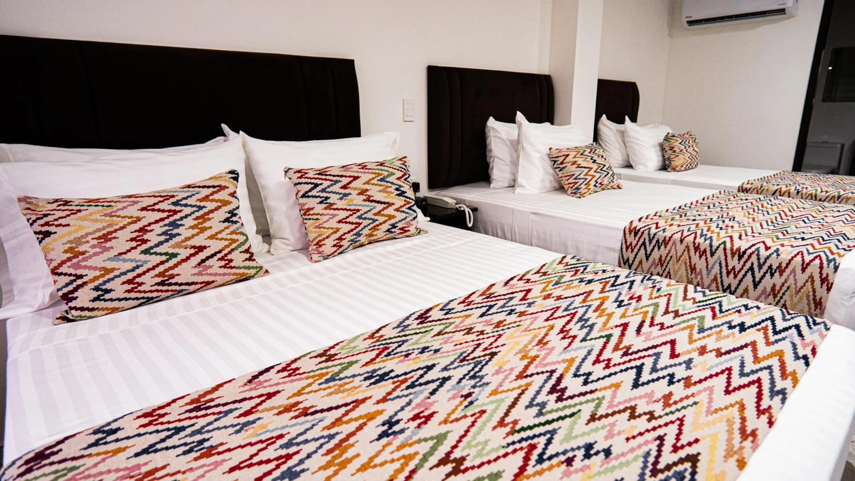 Bed in Hotel Arisha Cali