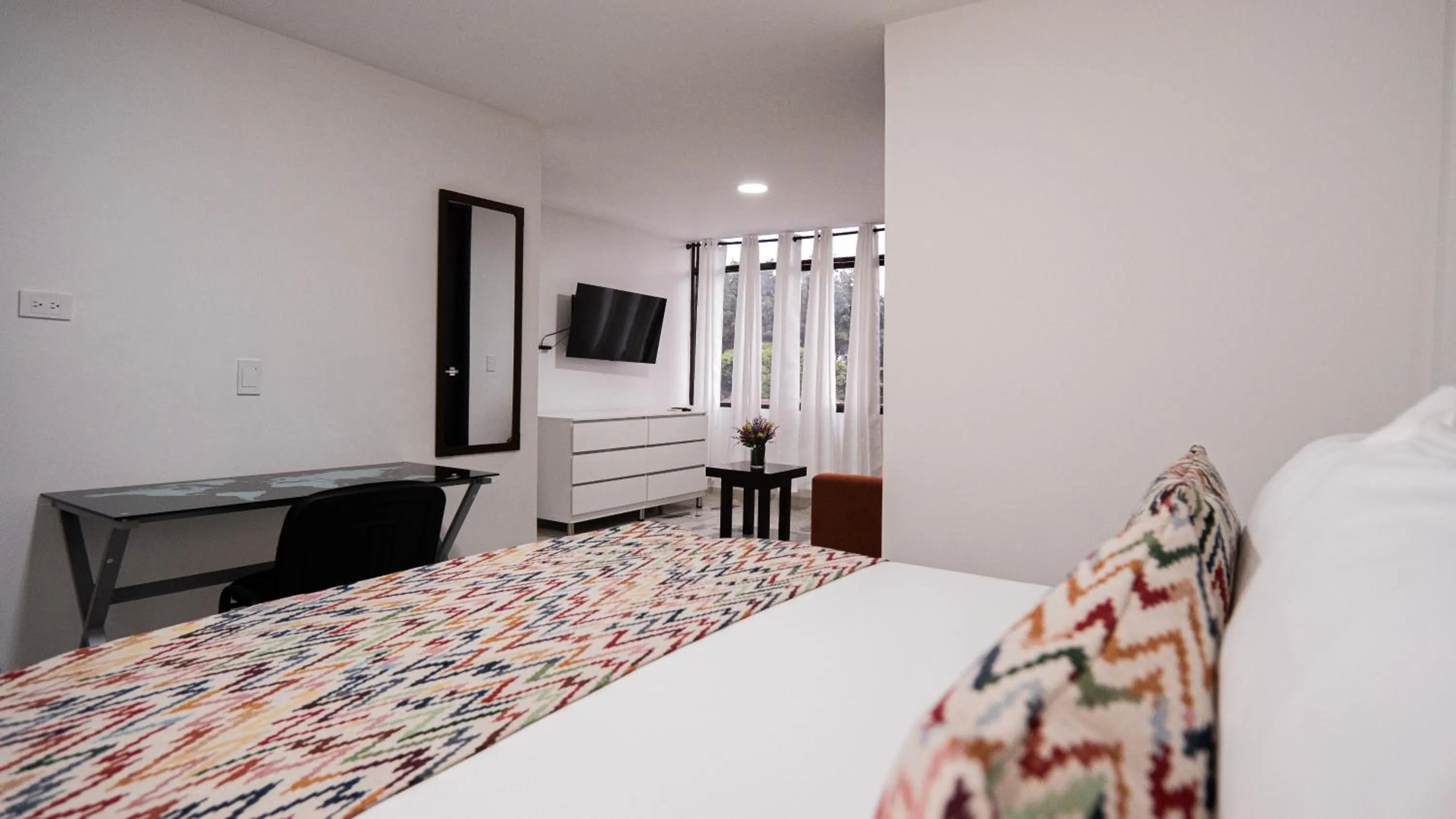 Bed in Hotel Arisha Cali