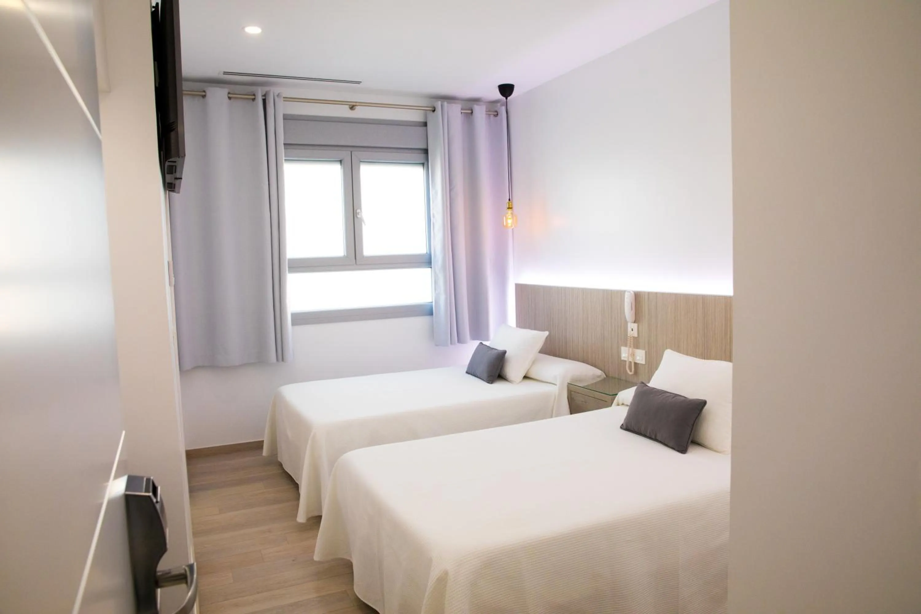 Photo of the whole room, Bed in Apartahotel Énfasis-Group