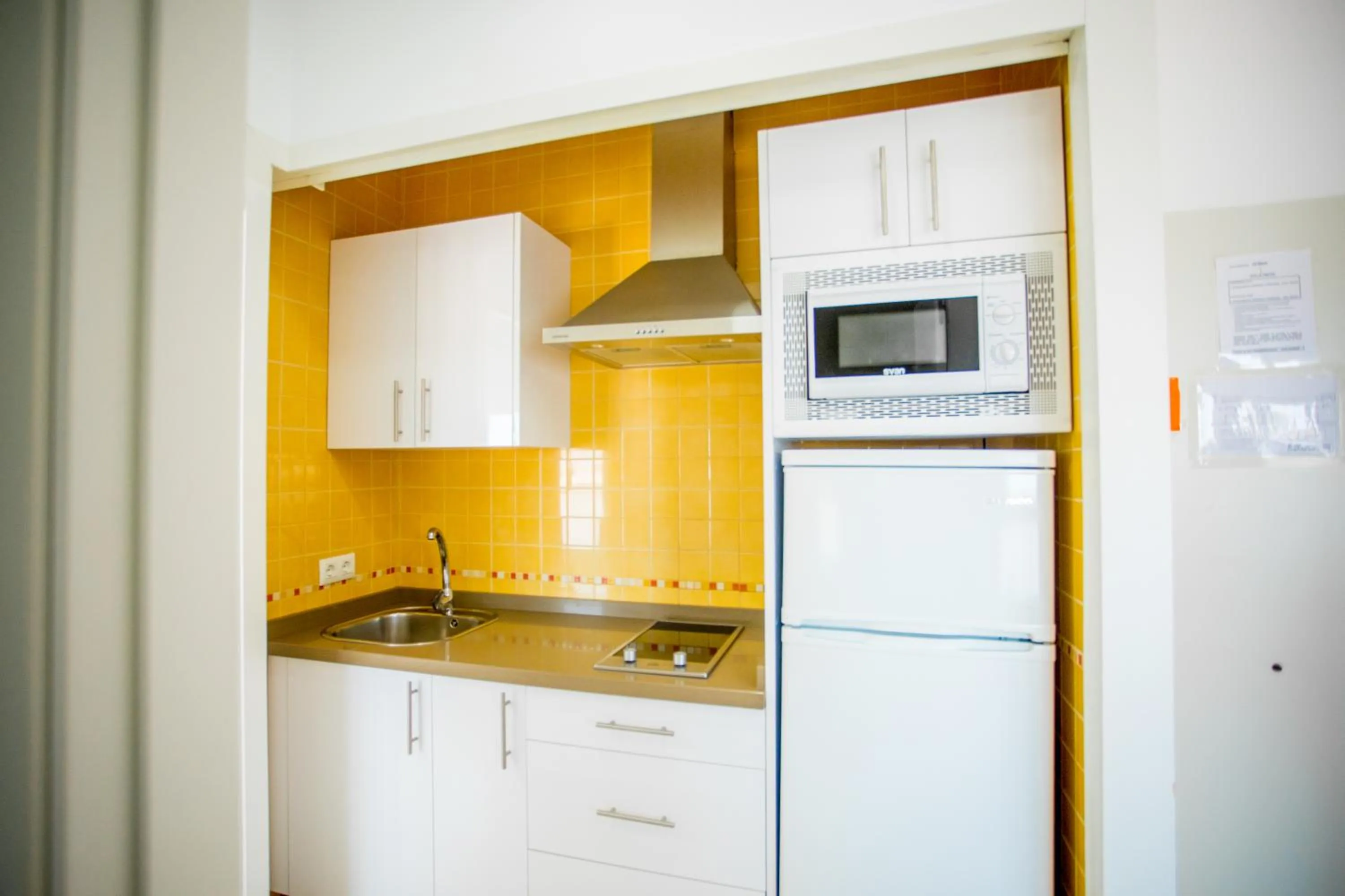 Kitchen or kitchenette in Apartahotel Énfasis-Group