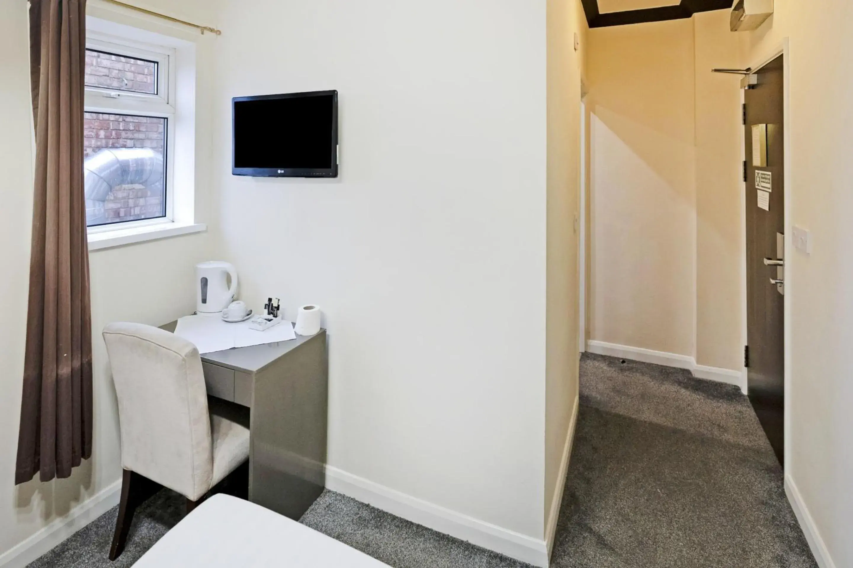 Bedroom, Bed in OYO The Baltimore Hotel Bedroom, Bed in OYO The Baltimore Hotel