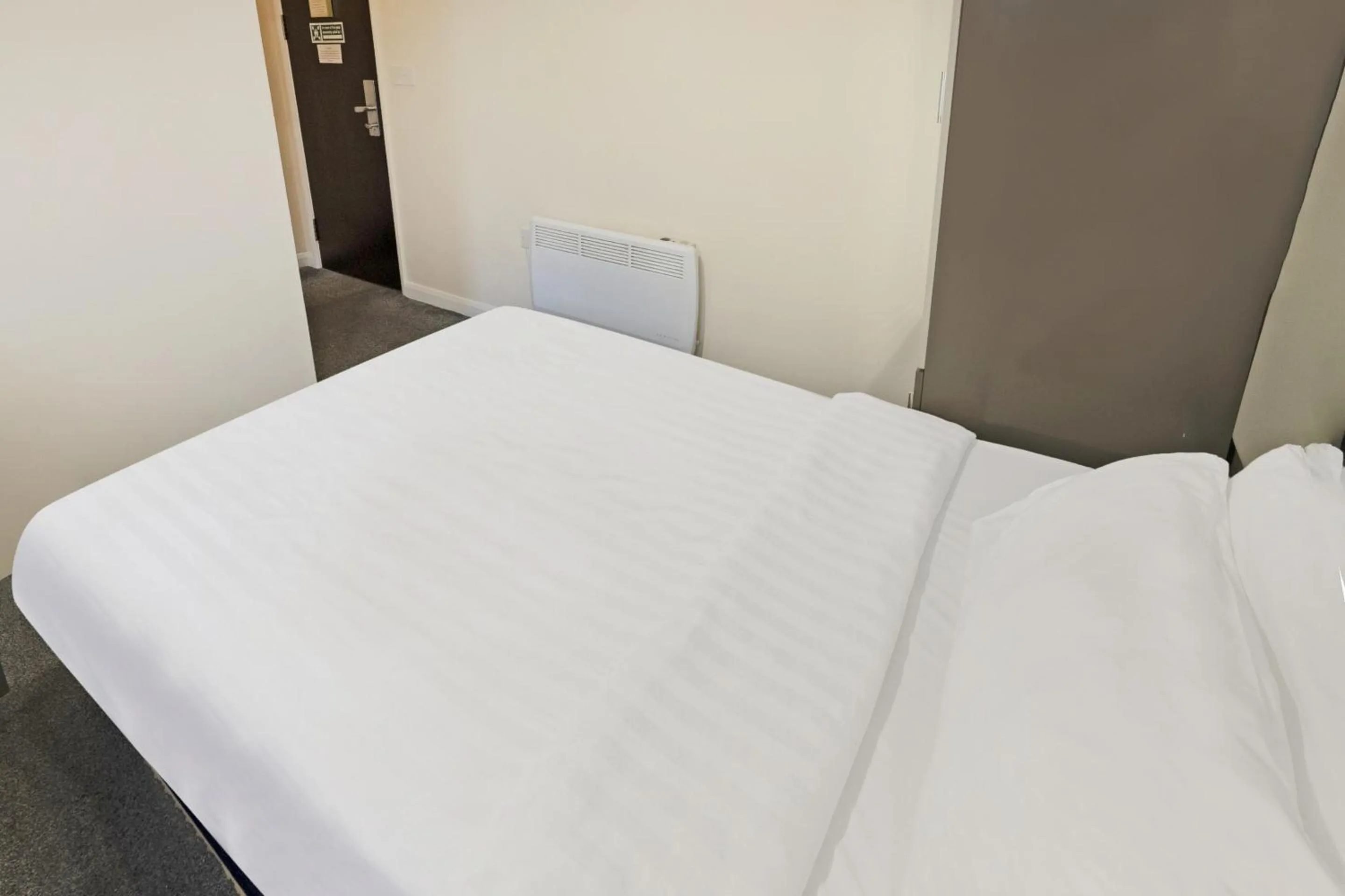 Bedroom, Bed in OYO The Baltimore Hotel