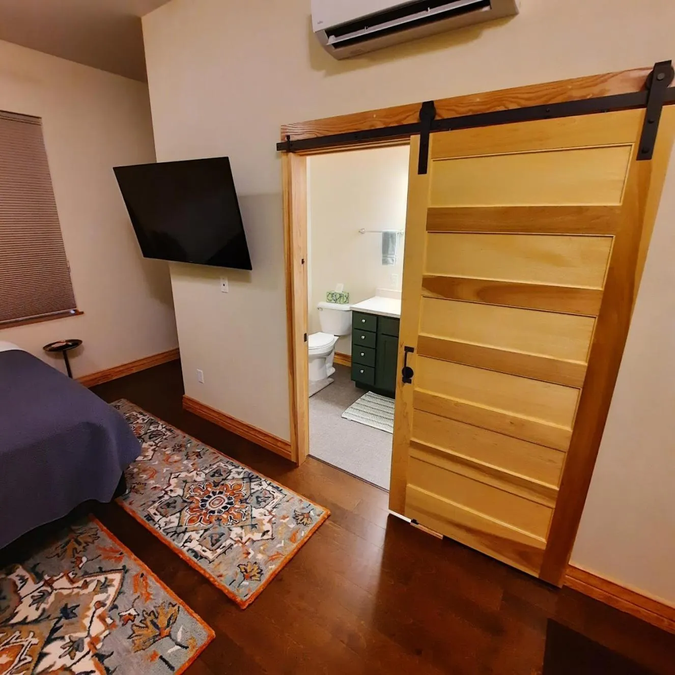 Bed in Goldfinch Suites