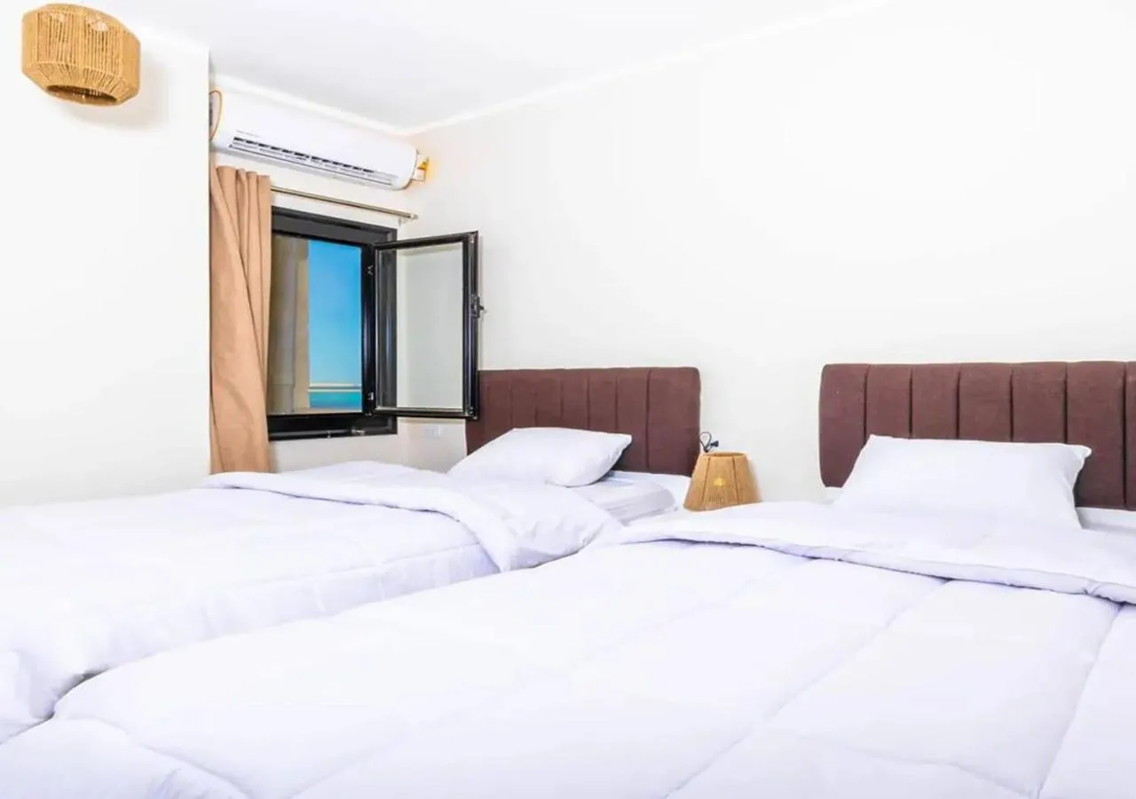 Bed in BLUE ViEW SUiTES