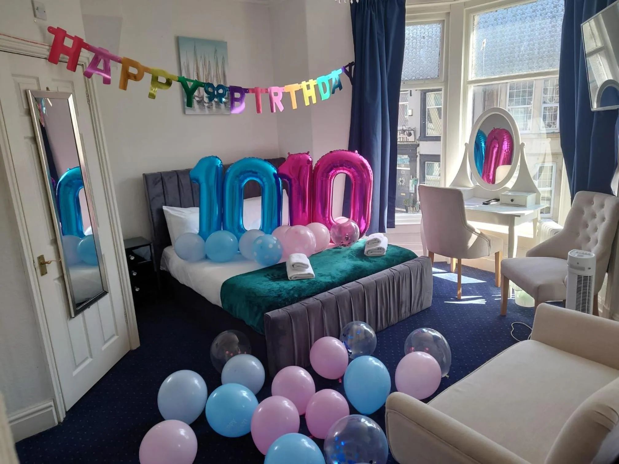 Bed in Harriette's Guest House