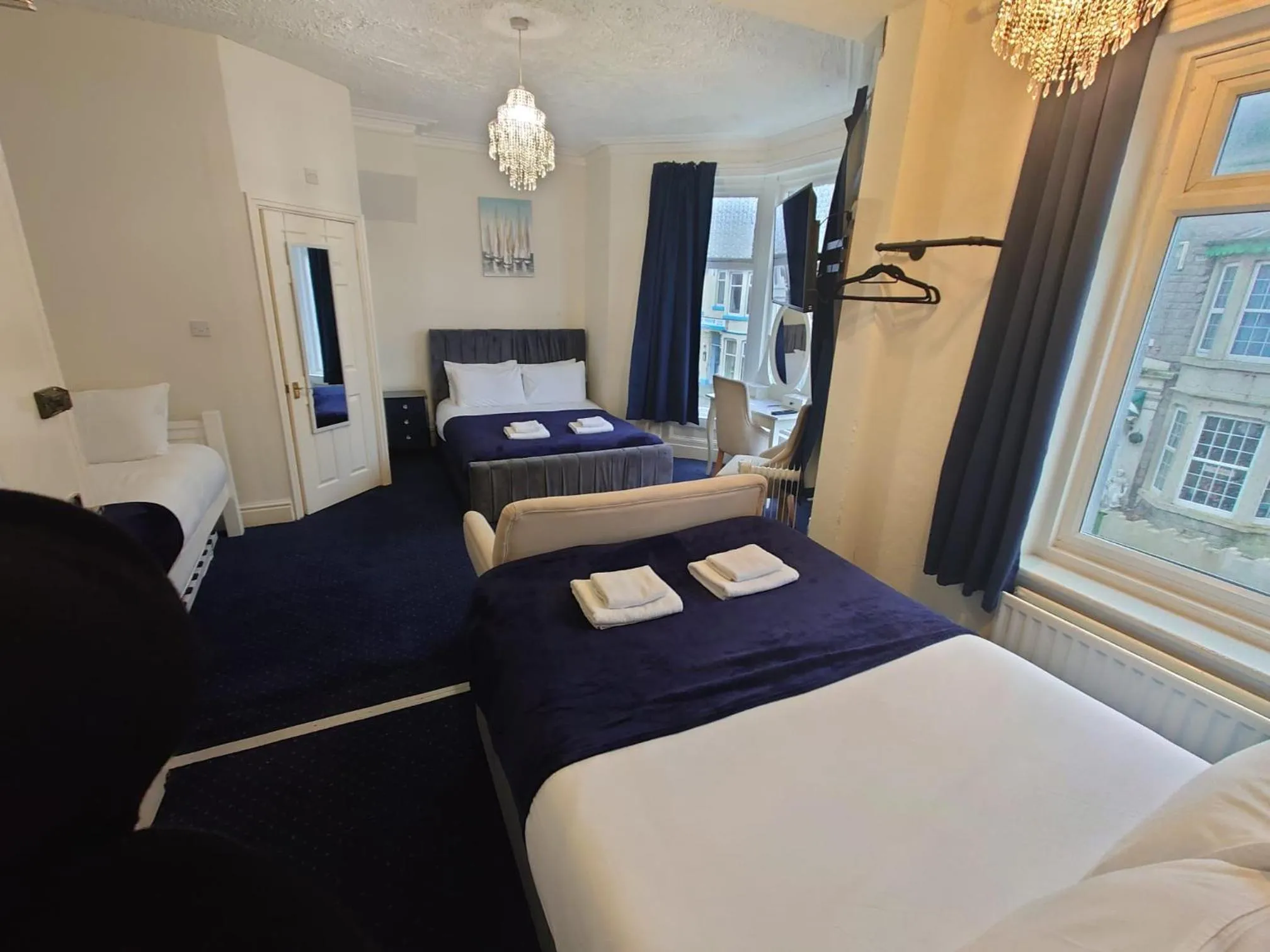 Bed in Harriette's Guest House