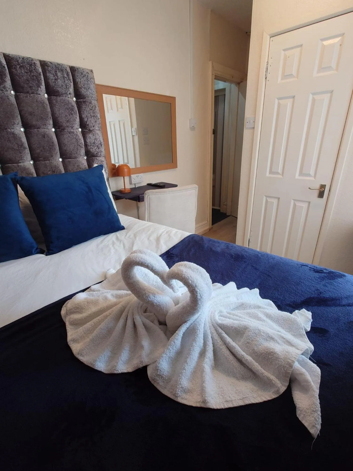 Bed in Harriette's Guest House