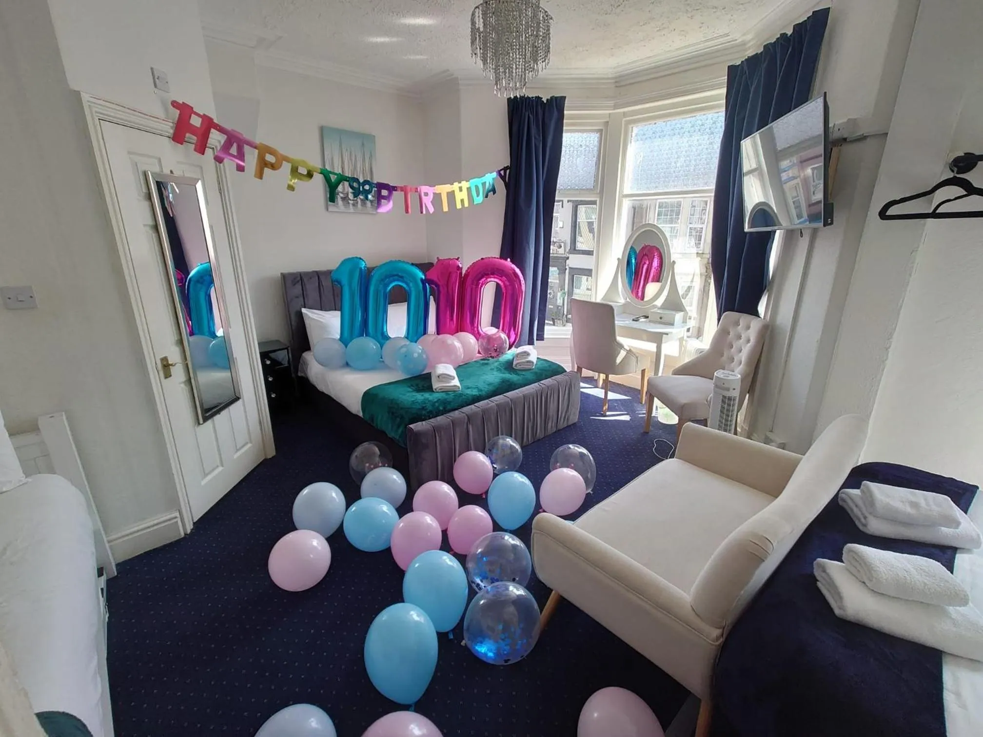 Bed in Harriette's Guest House