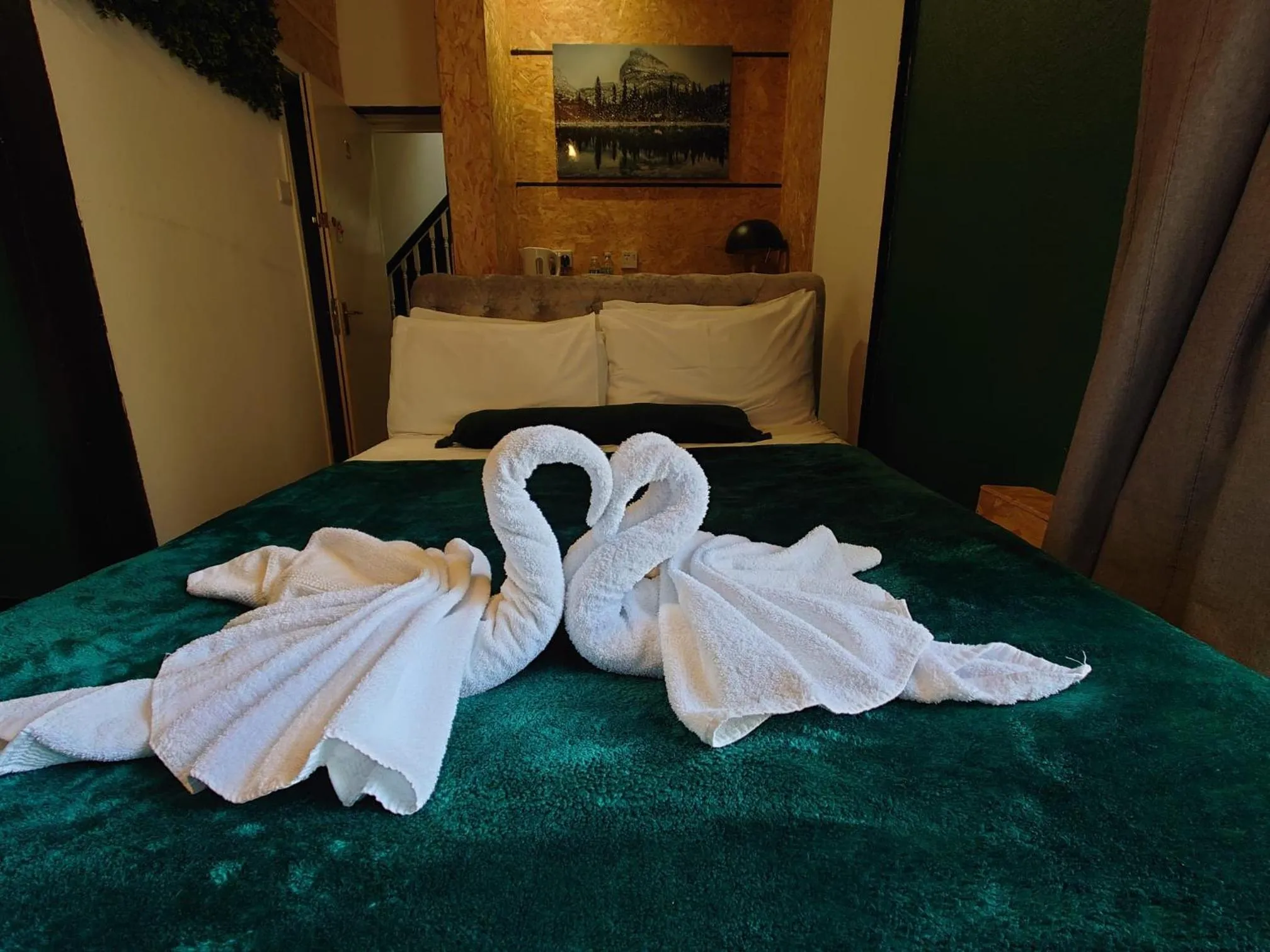 Bed in Harriette's Guest House