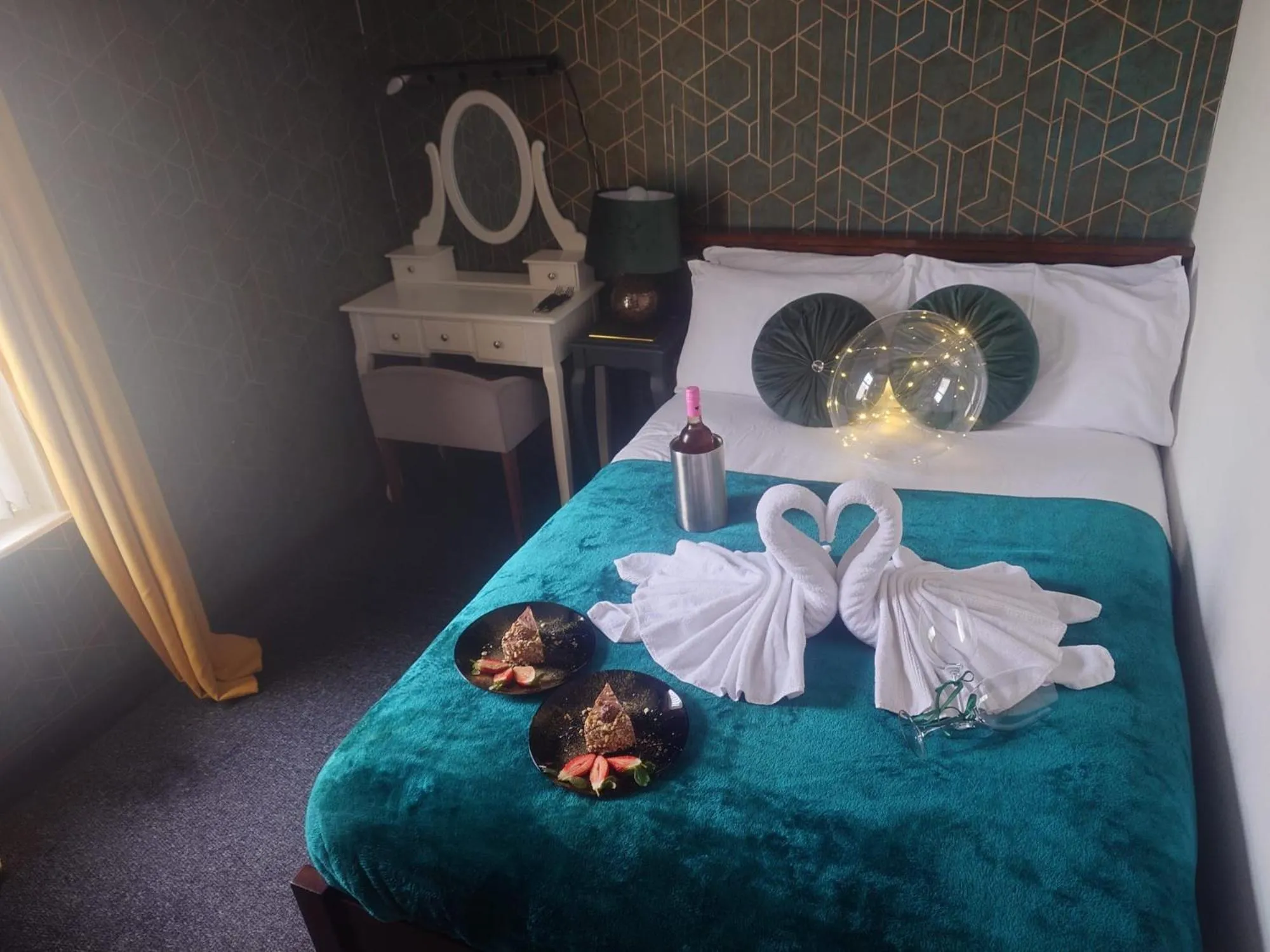 Bed in Harriette's Guest House