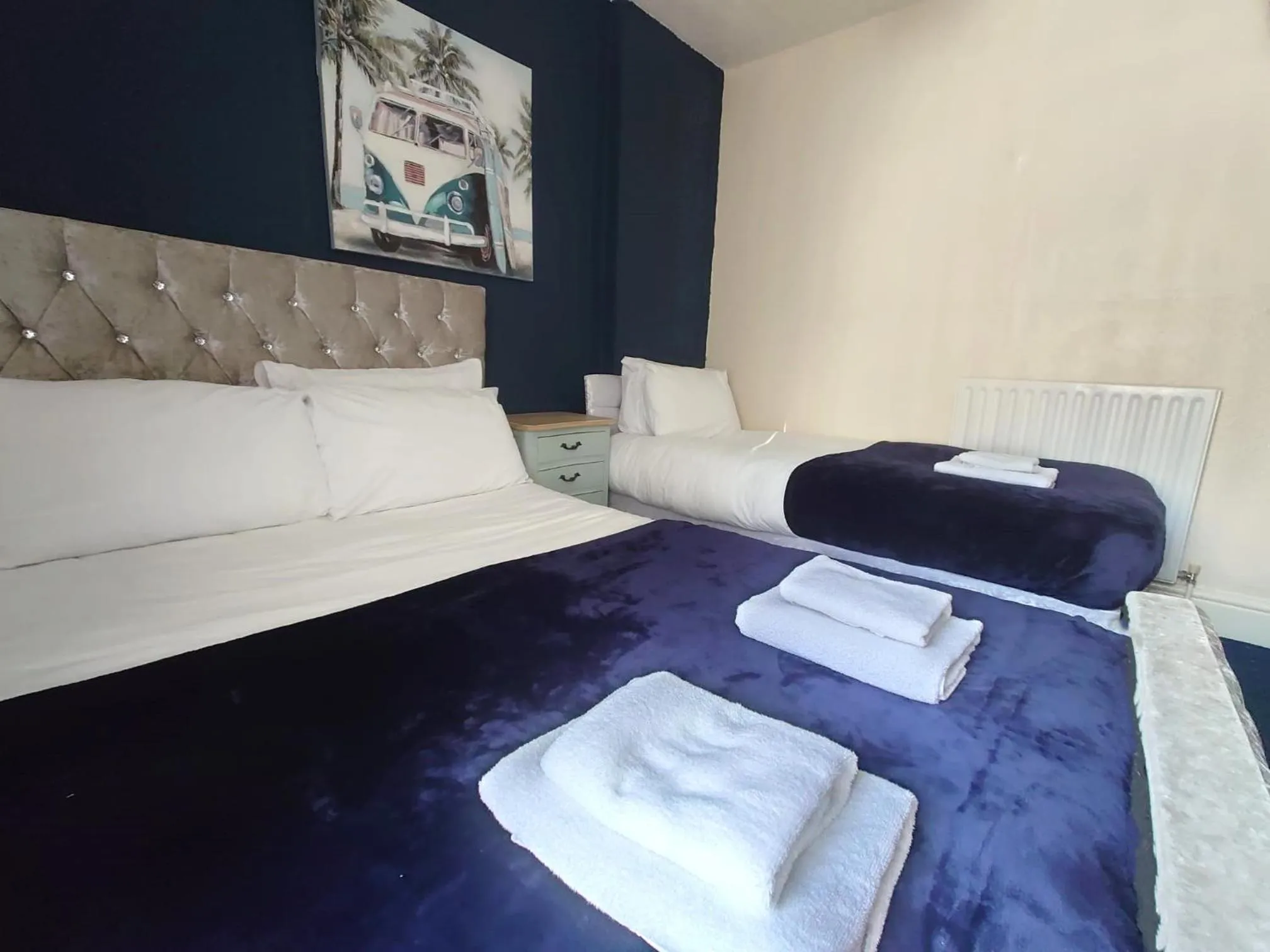 Bed in Harriette's Guest House