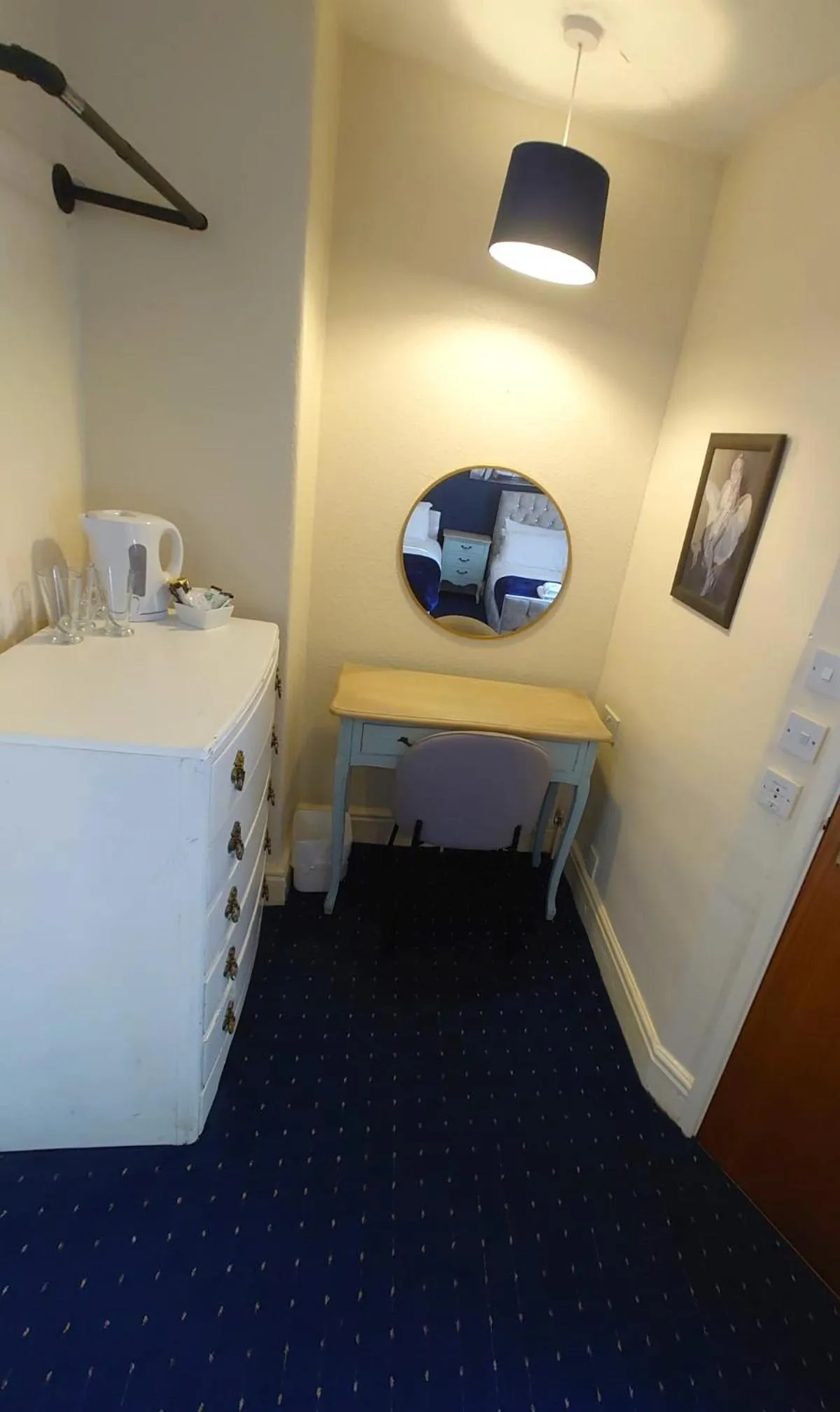 Bed in Harriette's Guest House