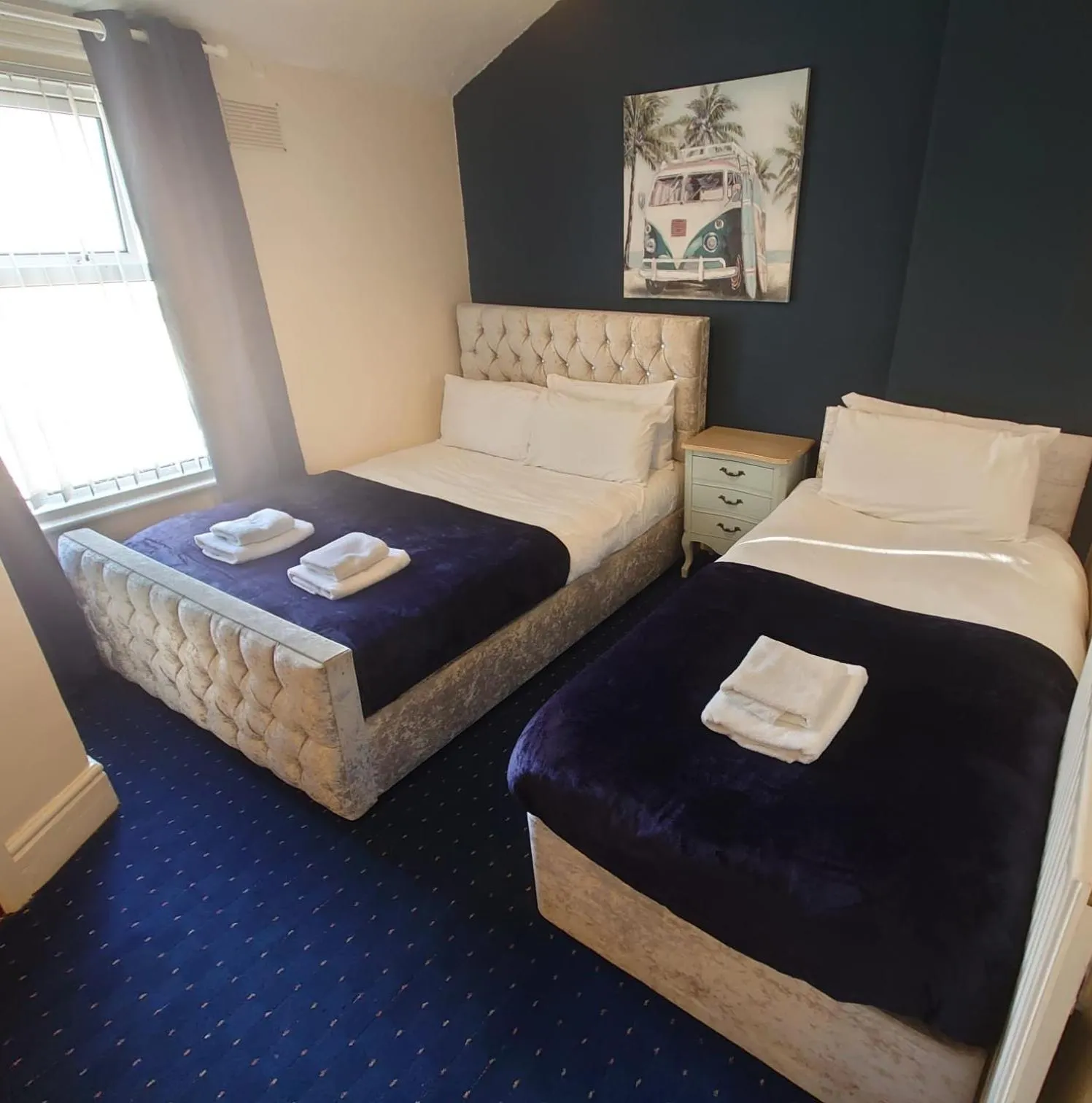 Bed in Harriette's Guest House