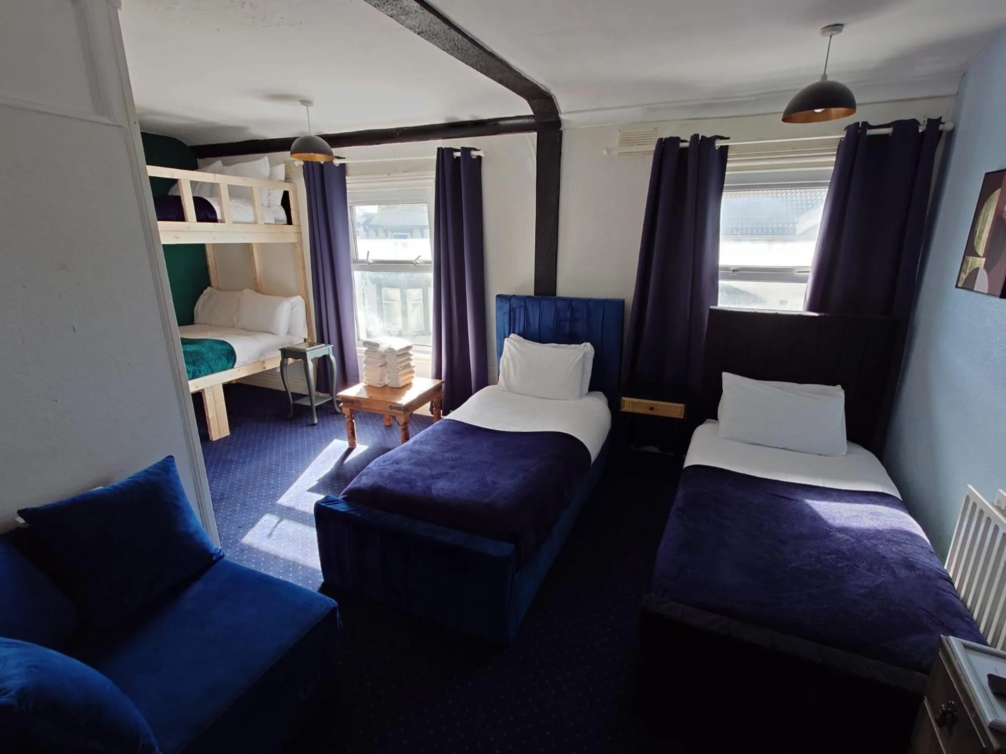 Bed in Harriette's Guest House