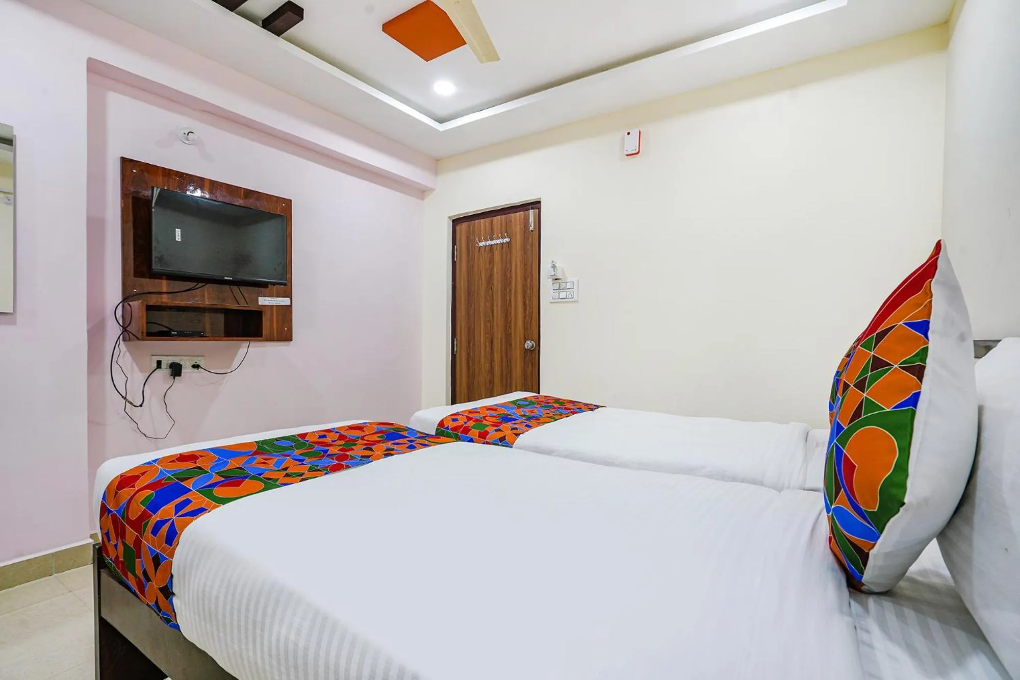 Bed in FabHotel Sri Karthikeya Grand - Nr Nexus Mall, Kukatpally